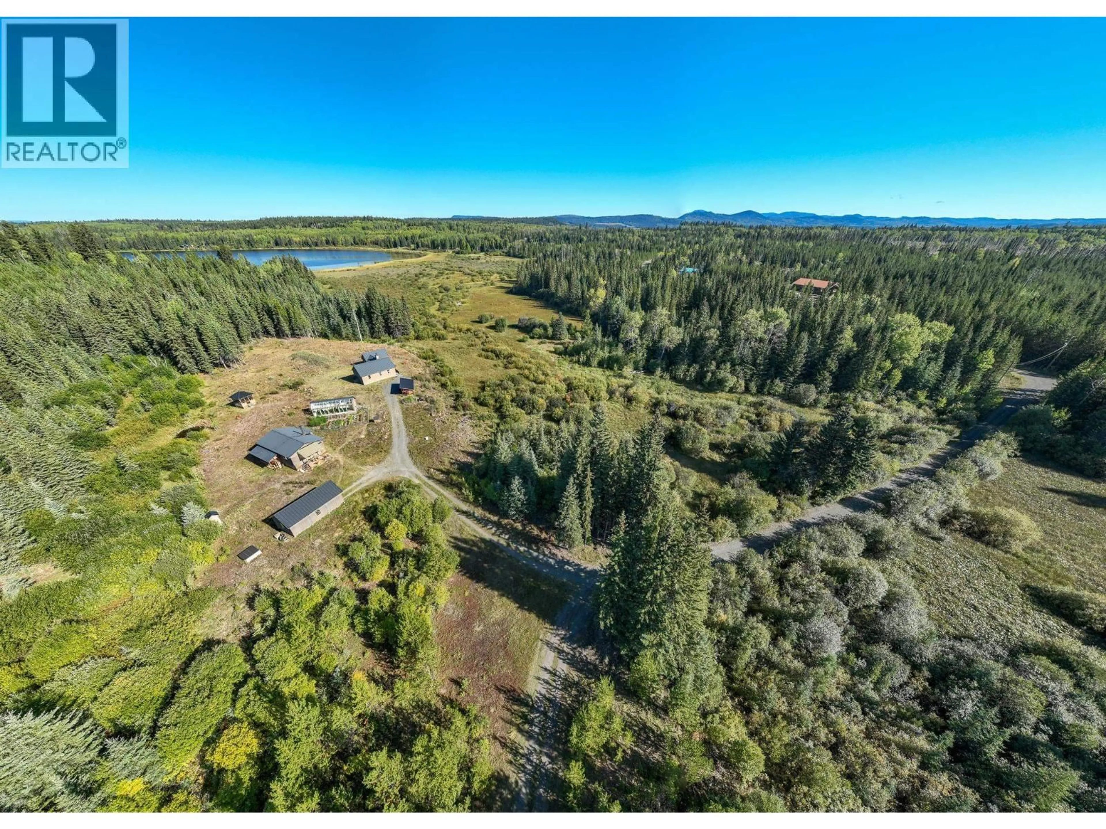 A pic from outside/outdoor area/front of a property/back of a property/a pic from drone, water/lake/river/ocean view for 7568 HIGH COUNTRY ROAD, Bridge Lake British Columbia V0K1X2