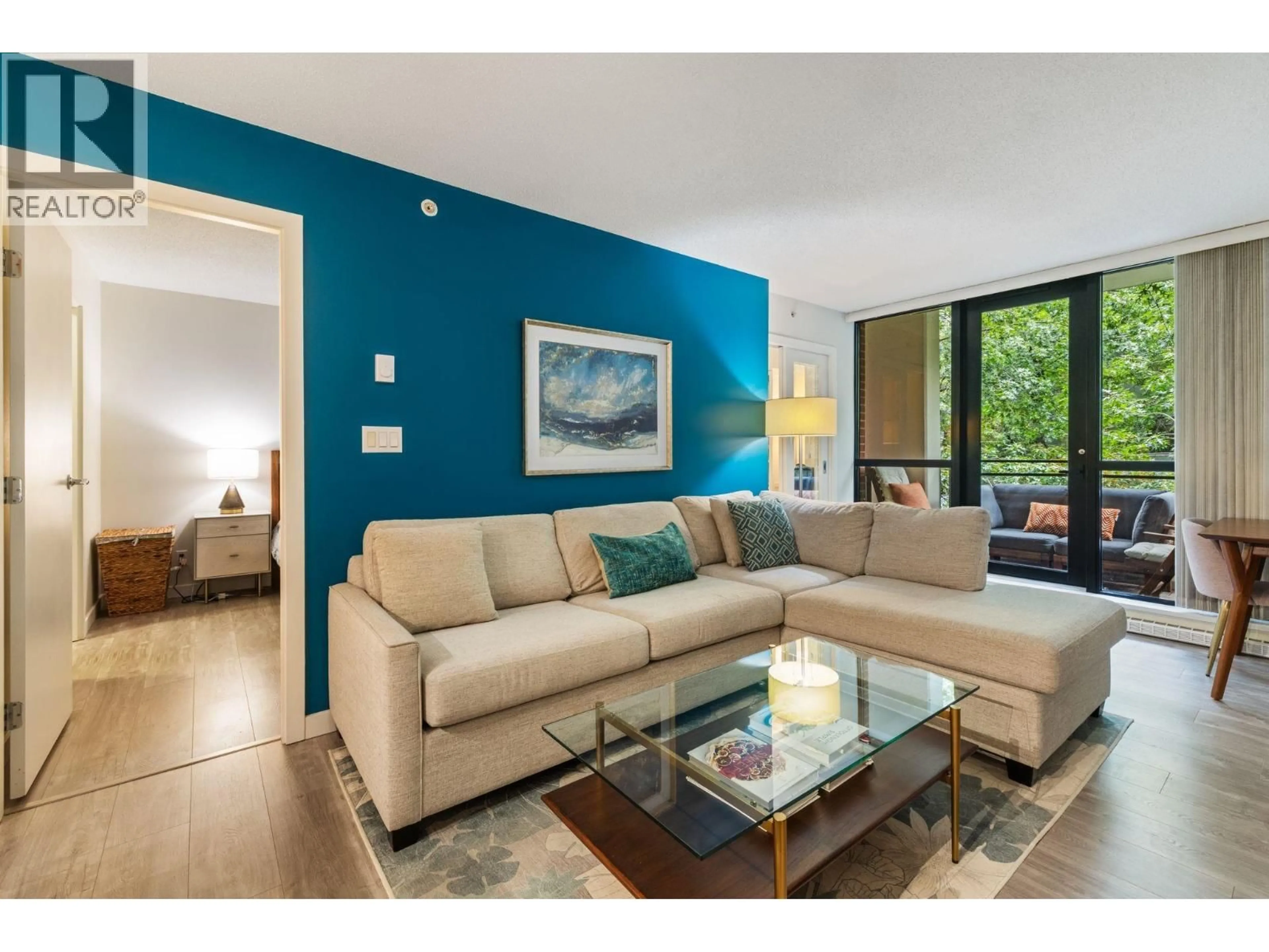 Living room with furniture, wood/laminate floor for 306 - 977 MAINLAND STREET, Vancouver British Columbia V6B1T2
