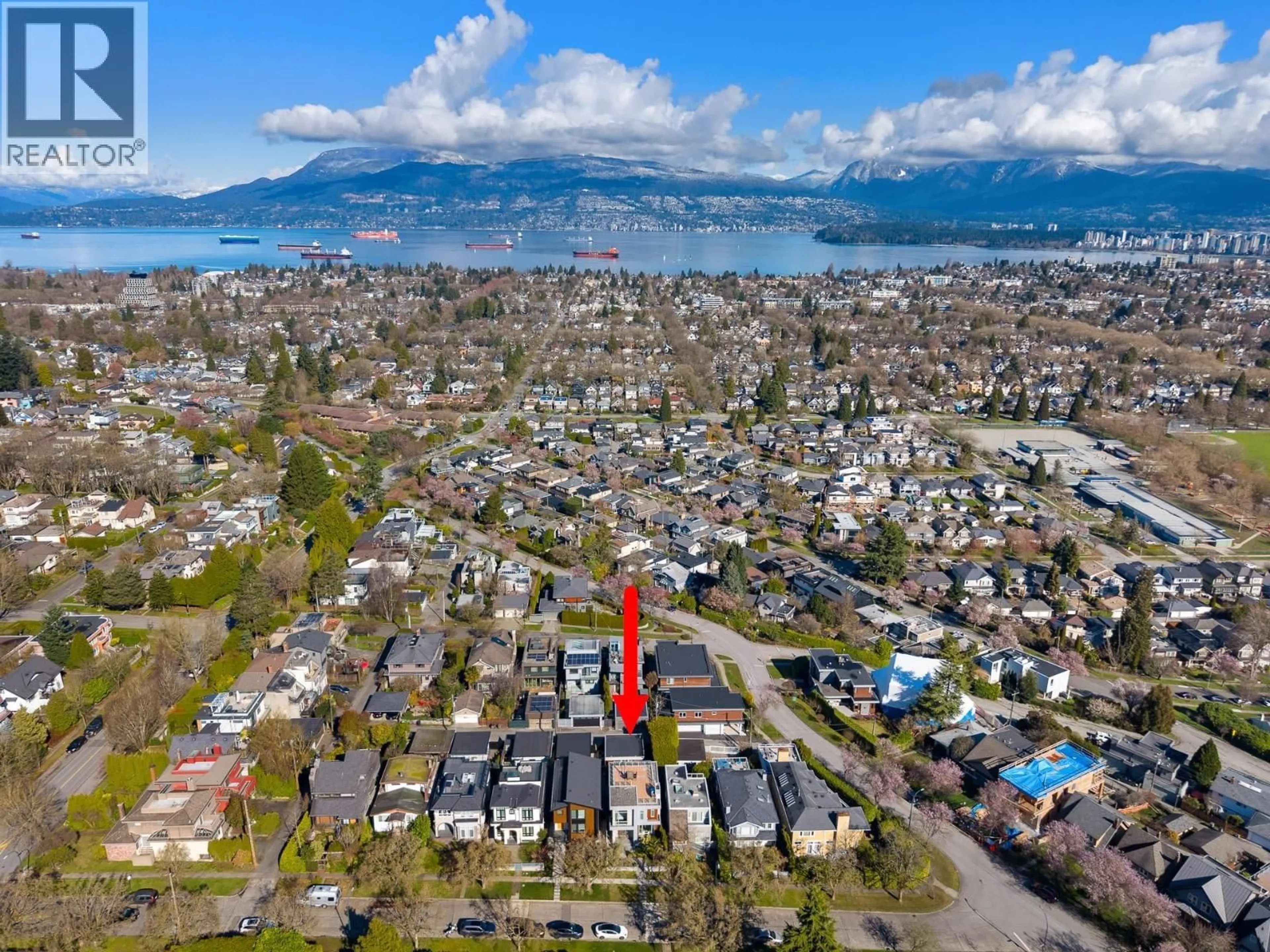 A pic from outside/outdoor area/front of a property/back of a property/a pic from drone, water/lake/river/ocean view for 3253 21ST AVENUE, Vancouver British Columbia V6L1L3
