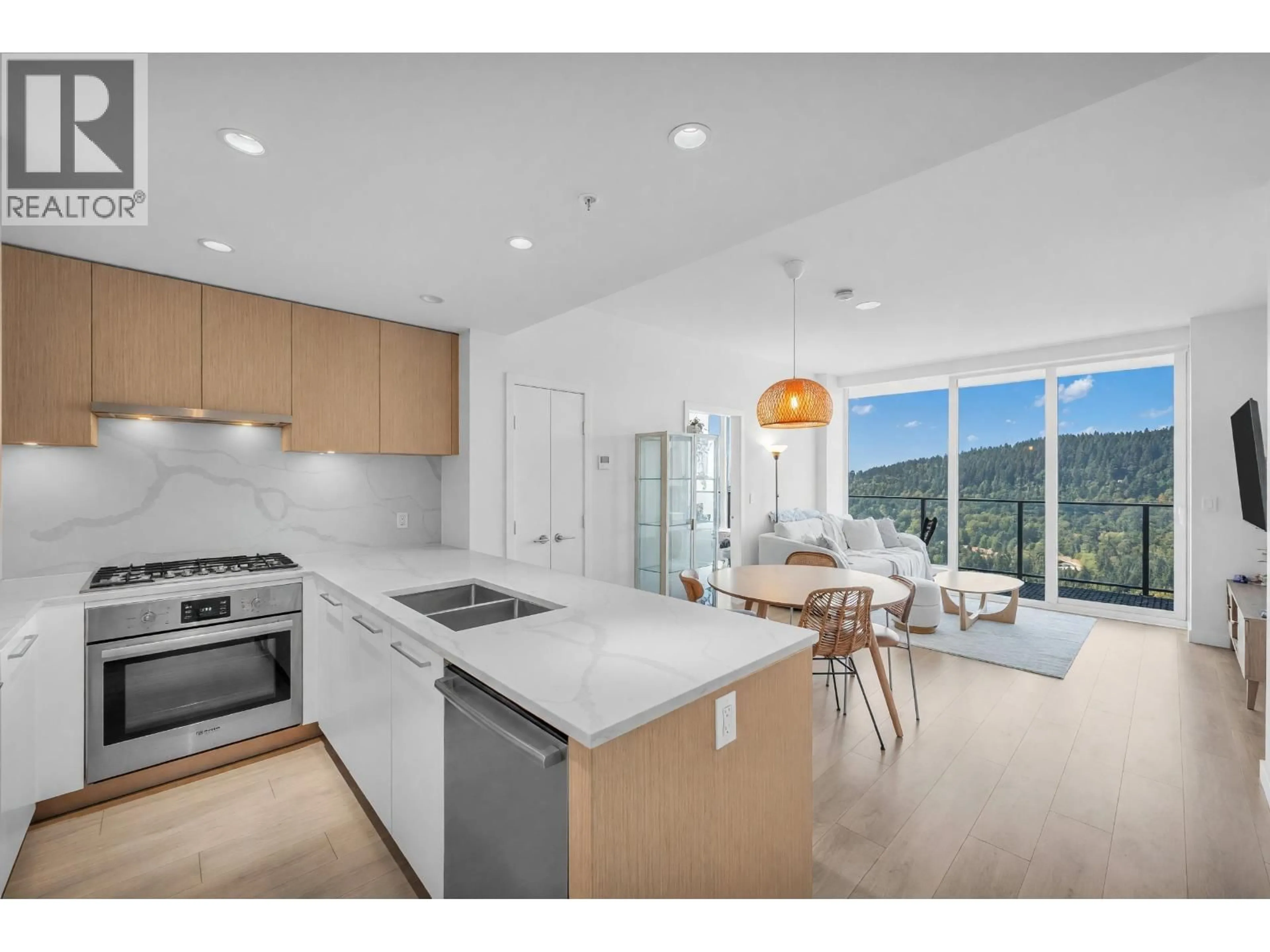 Open concept kitchen, ceramic/tile floor for 3202 - 567 CLARKE ROAD, Coquitlam British Columbia V3J0K7