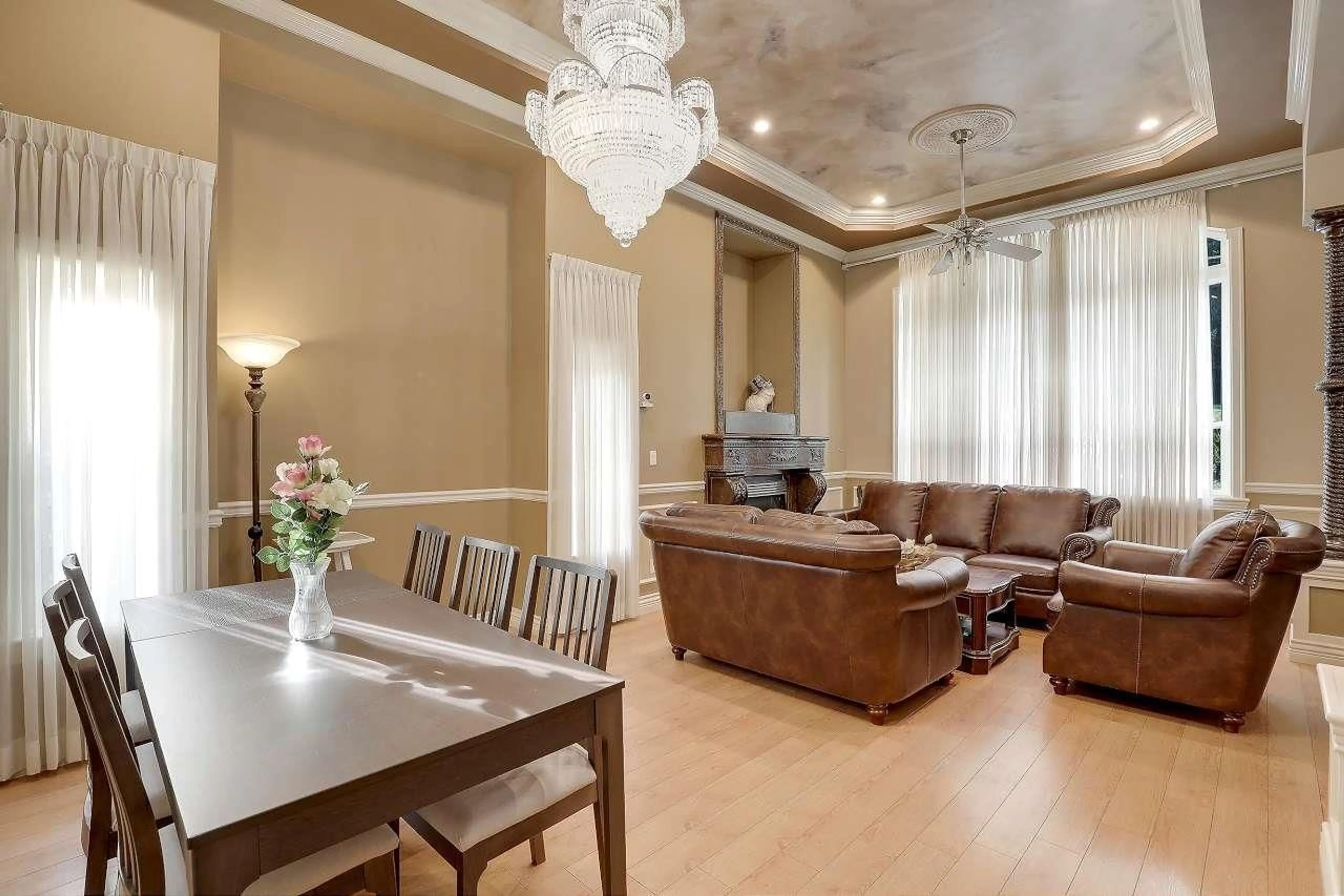 Living room with furniture, wood/laminate floor for 14078 68 AVENUE, Surrey British Columbia V3W2H2