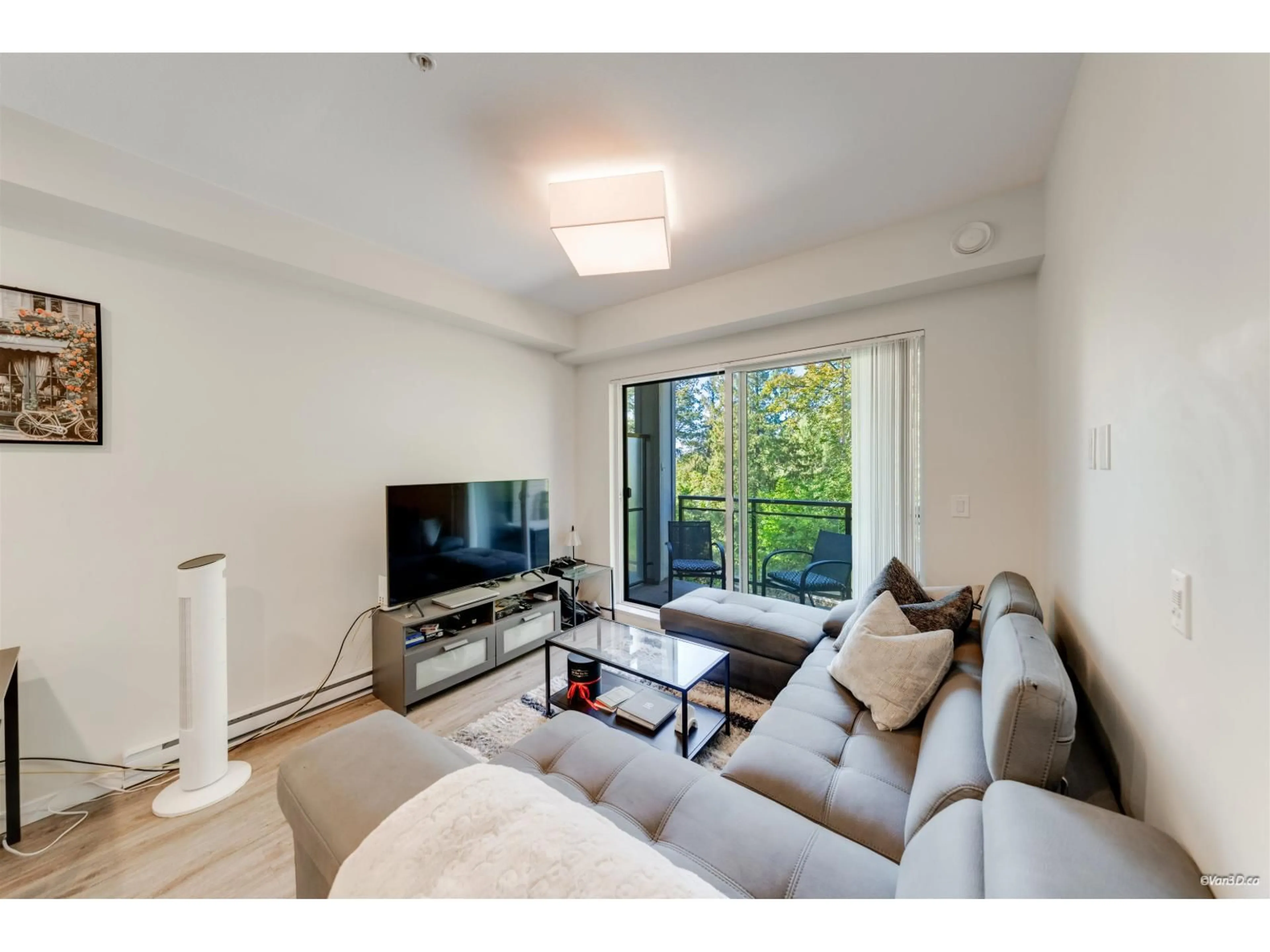 Living room with furniture, wood/laminate floor for A207 - 20087 68 AVENUE, Langley British Columbia V2Y0Y2