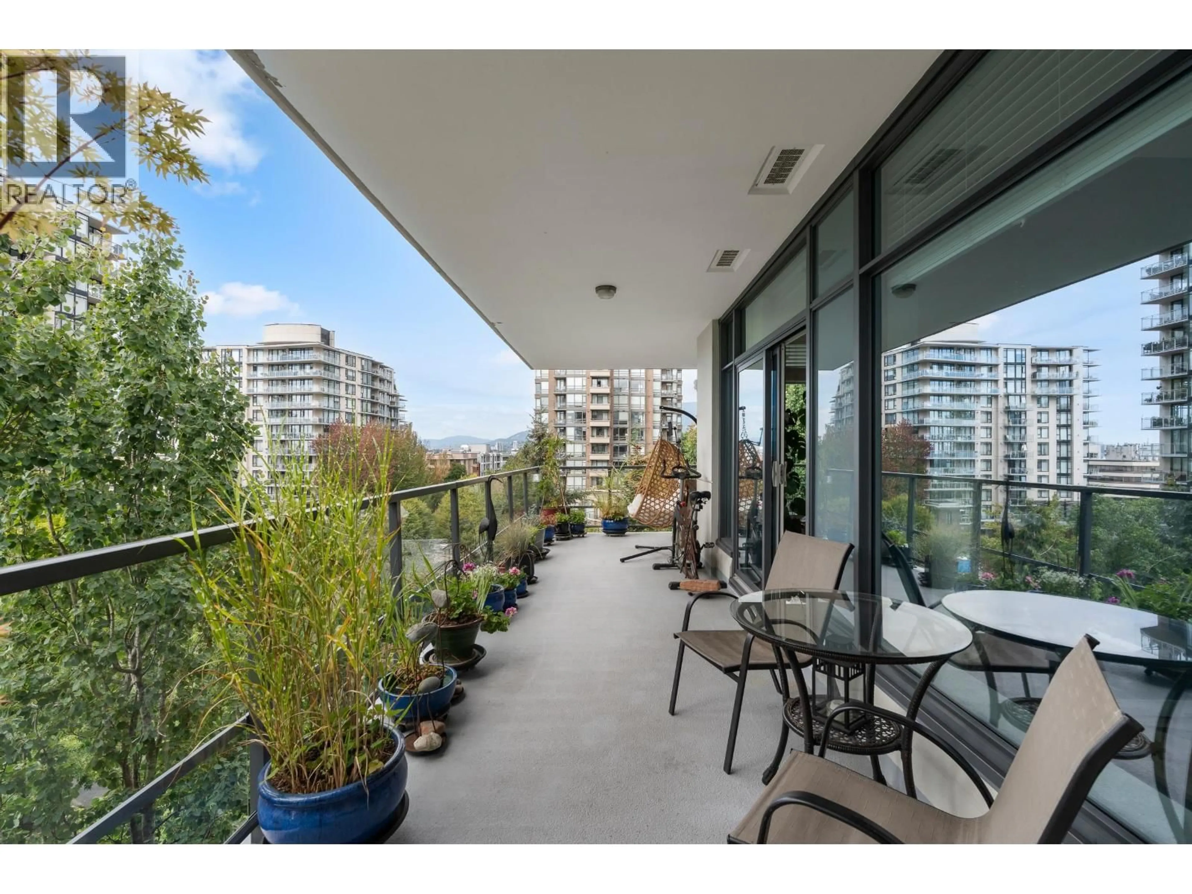 Patio, city buildings view from balcony for 308 - 135 2ND STREET, North Vancouver British Columbia V7M0C5