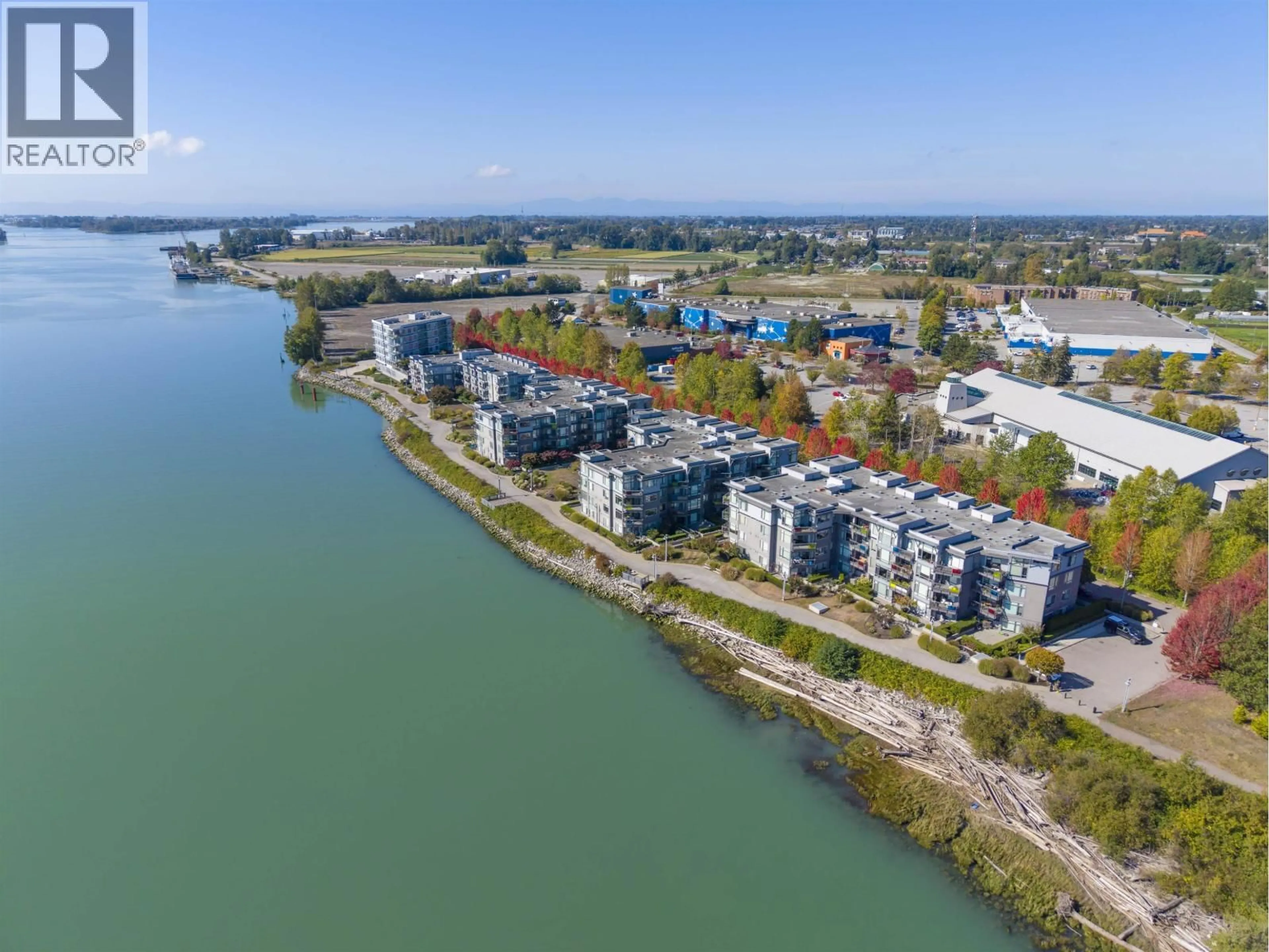 A pic from outside/outdoor area/front of a property/back of a property/a pic from drone, water/lake/river/ocean view for 207 - 14300 RIVERPORT WAY, Richmond British Columbia V6W0A4
