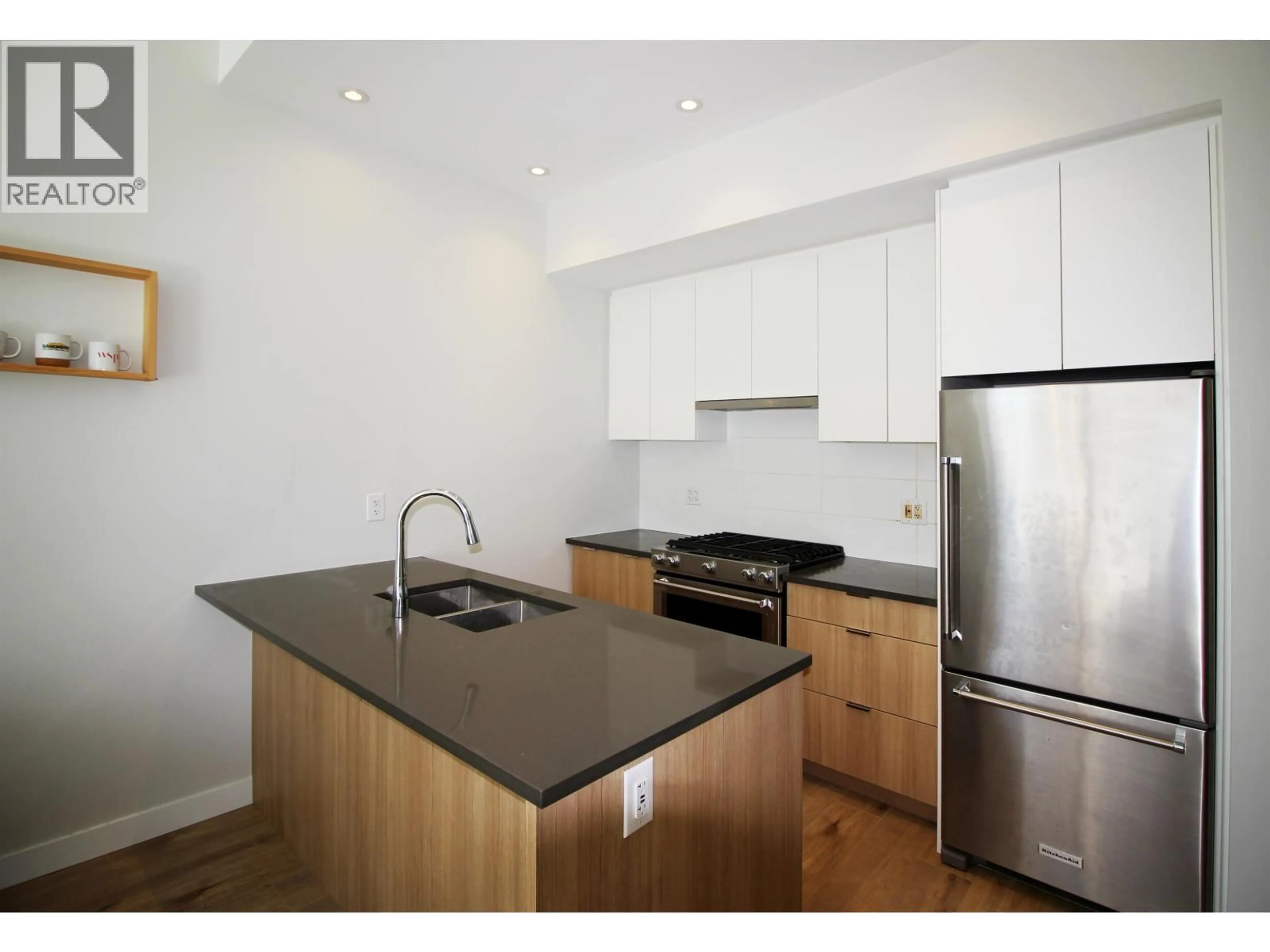 Standard kitchen, wood/laminate floor for 522 - 3430 KENT AVENUE SOUTH, Vancouver British Columbia V5S0G7