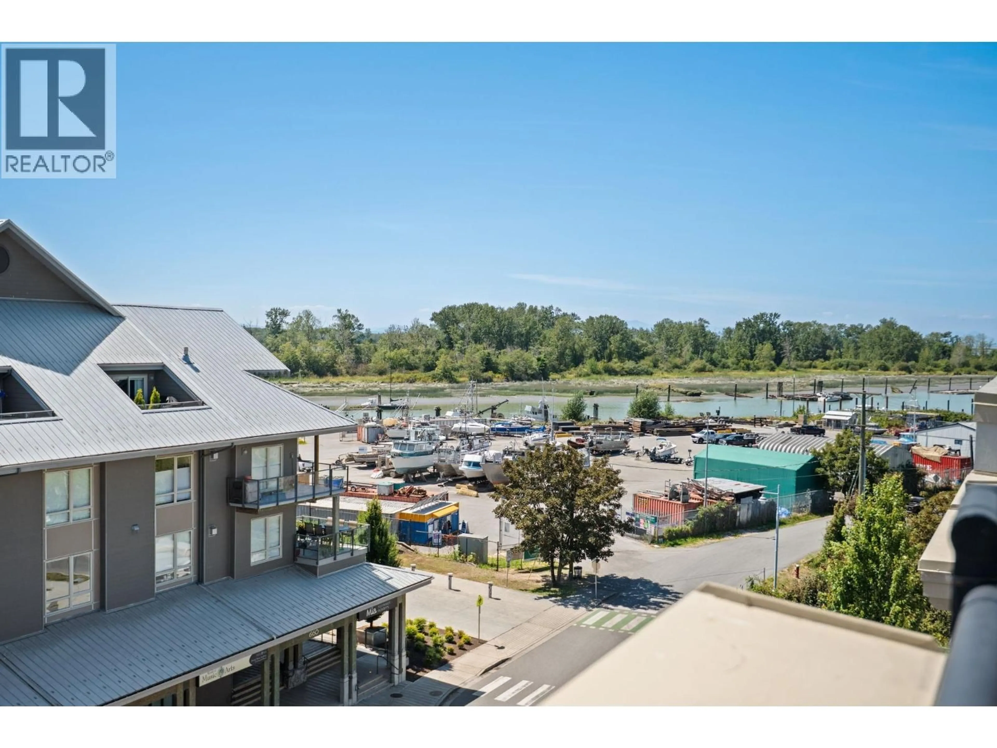 A pic from outside/outdoor area/front of a property/back of a property/a pic from drone, water/lake/river/ocean view for 303 - 6077 LONDON ROAD, Richmond British Columbia V7E0A7
