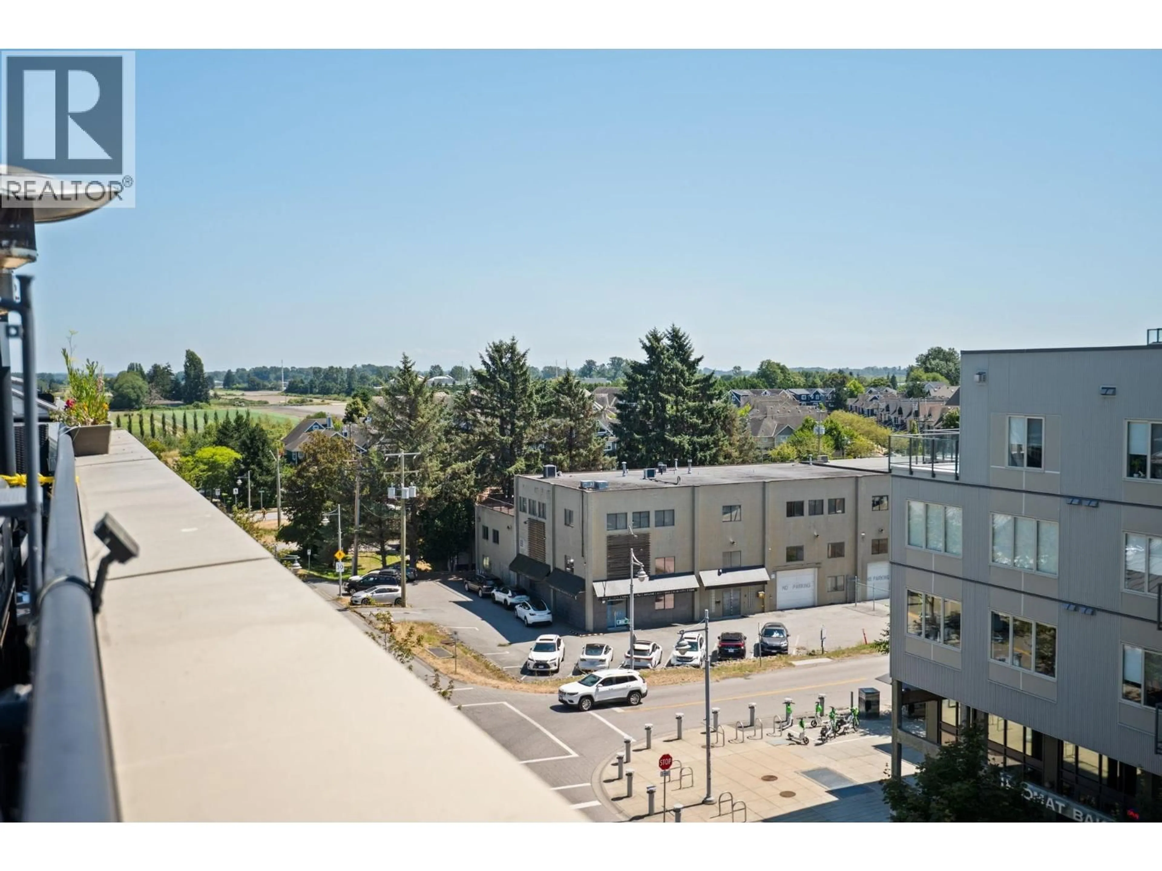 A pic from outside/outdoor area/front of a property/back of a property/a pic from drone, city buildings view from balcony for 303 - 6077 LONDON ROAD, Richmond British Columbia V7E0A7