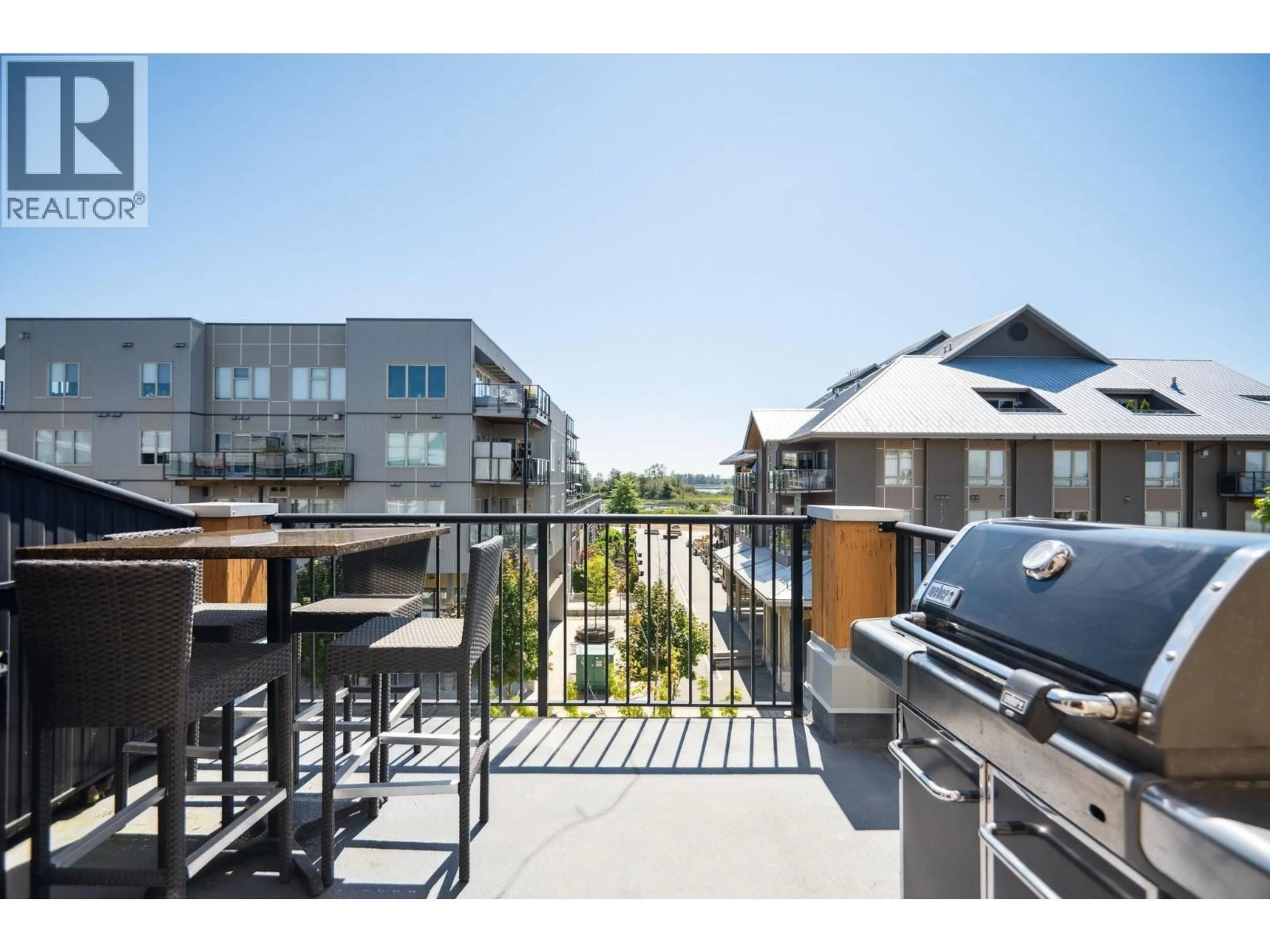 Patio, city buildings view from balcony for 303 - 6077 LONDON ROAD, Richmond British Columbia V7E0A7