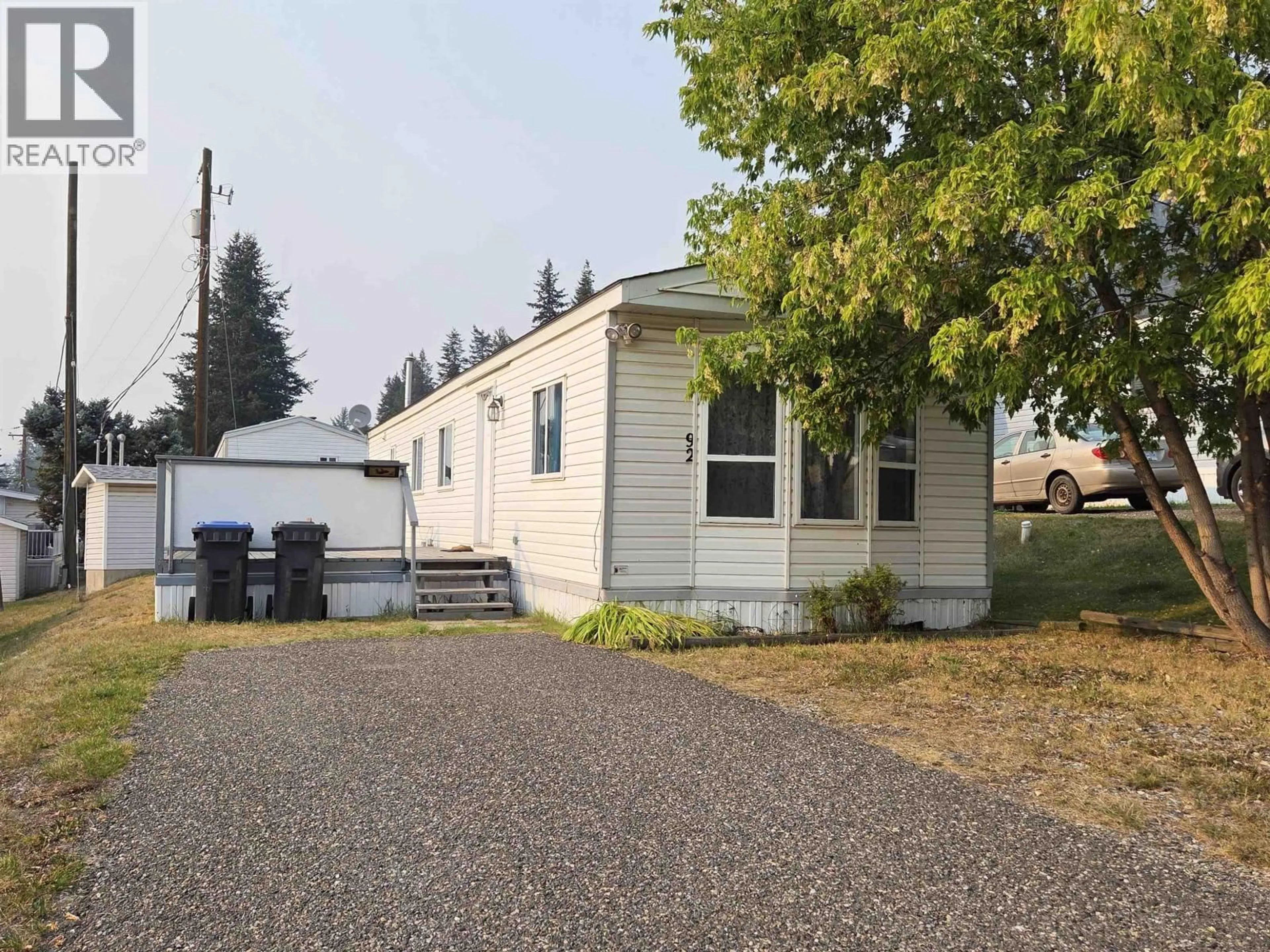 Home with vinyl exterior material, street for 92 - 770 ELEVENTH AVENUE, Williams Lake British Columbia V2G2M4
