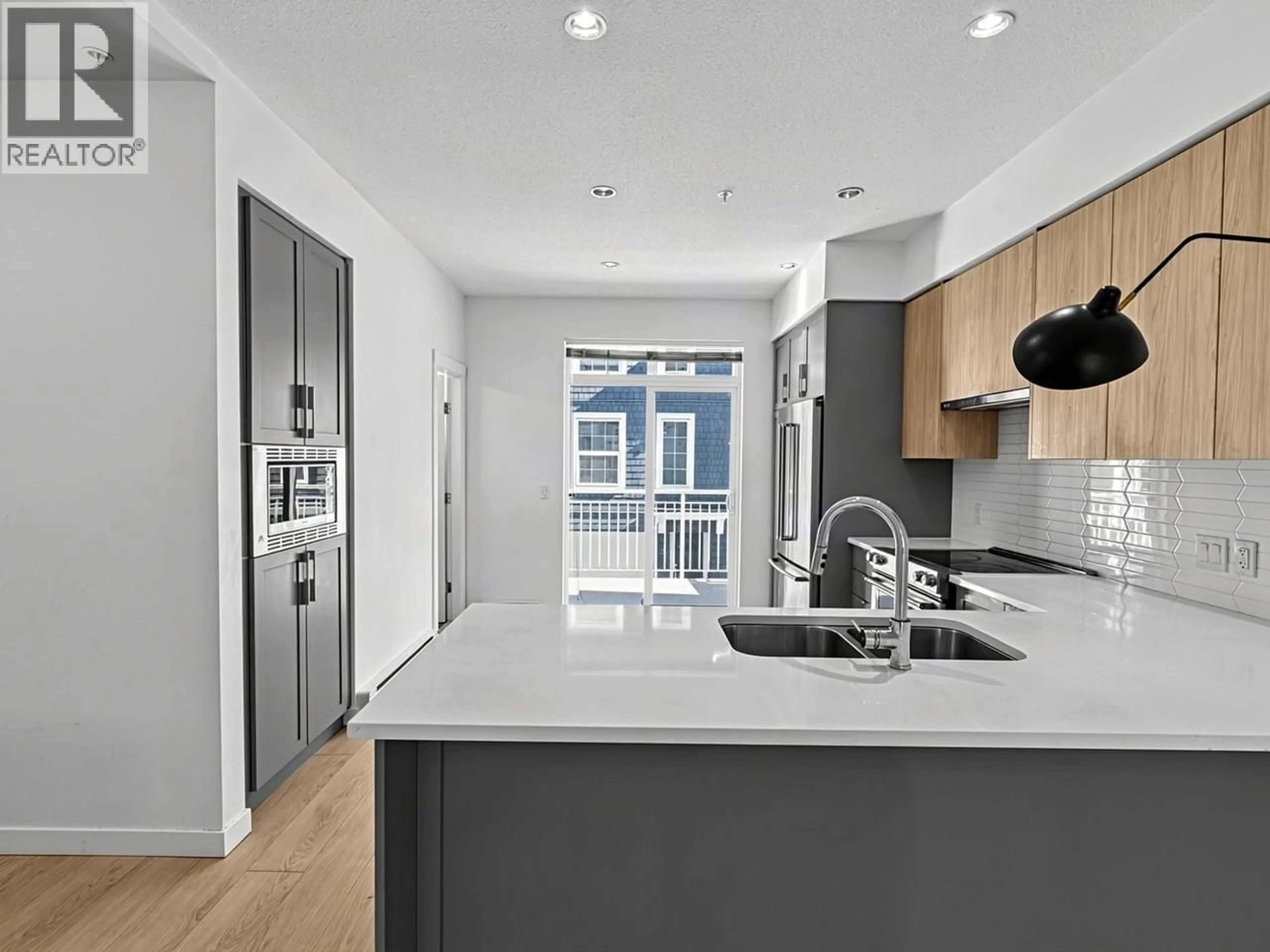 Open concept kitchen, unknown for 17 - 2560 PITT RIVER ROAD, Port Coquitlam British Columbia V3C0G6