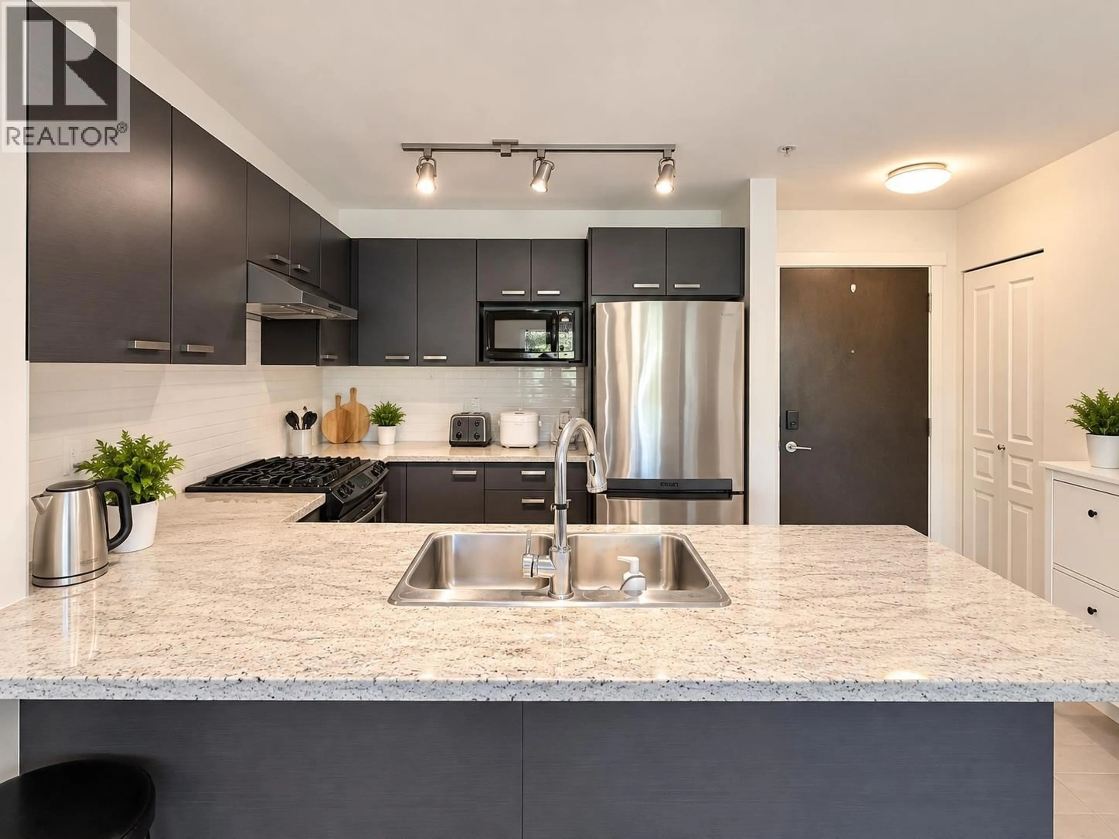 Open concept kitchen, unknown for 218 - 9399 TOMICKI AVENUE, Richmond British Columbia V6X0H6