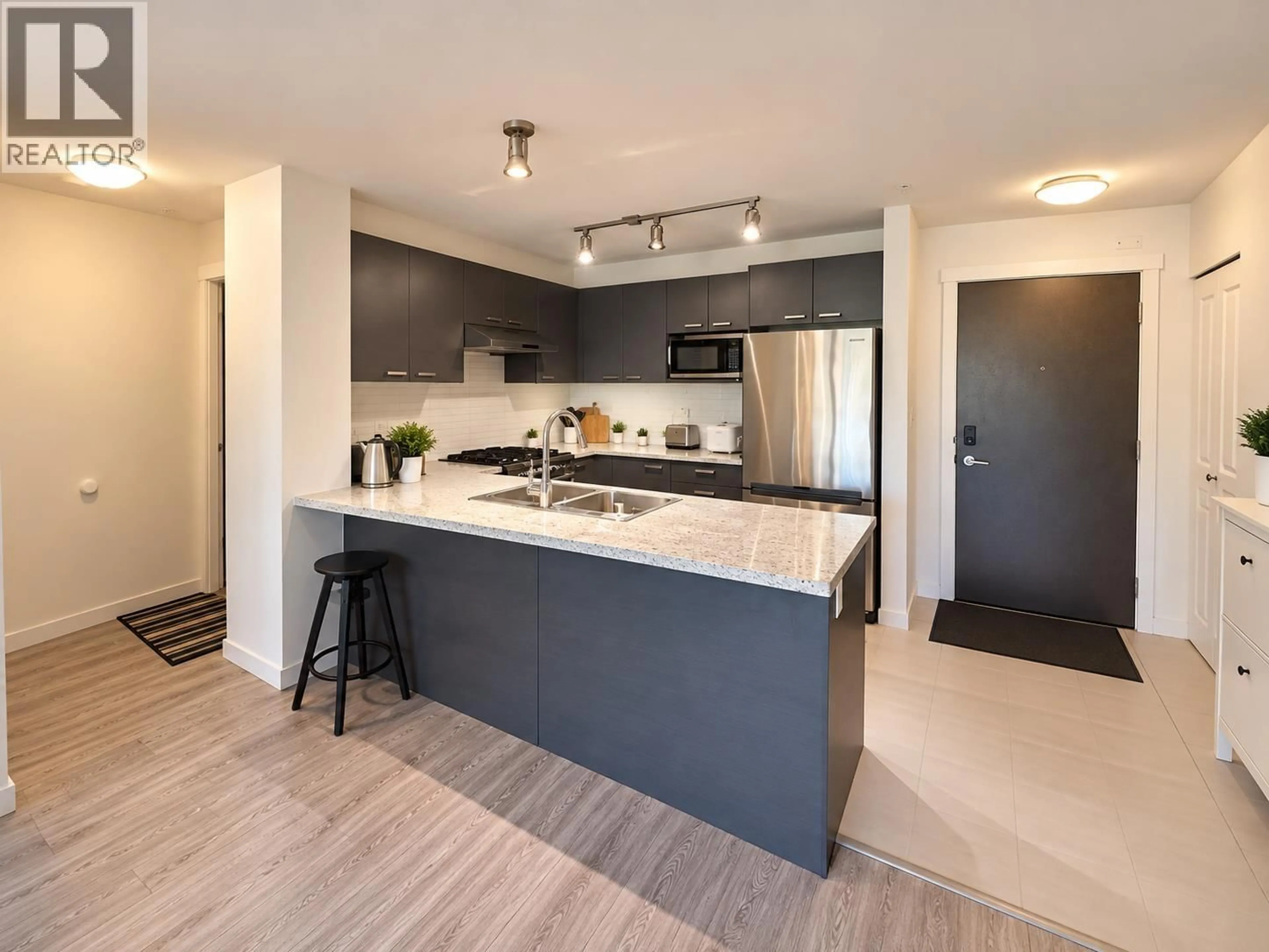 Open concept kitchen, unknown for 218 - 9399 TOMICKI AVENUE, Richmond British Columbia V6X0H6