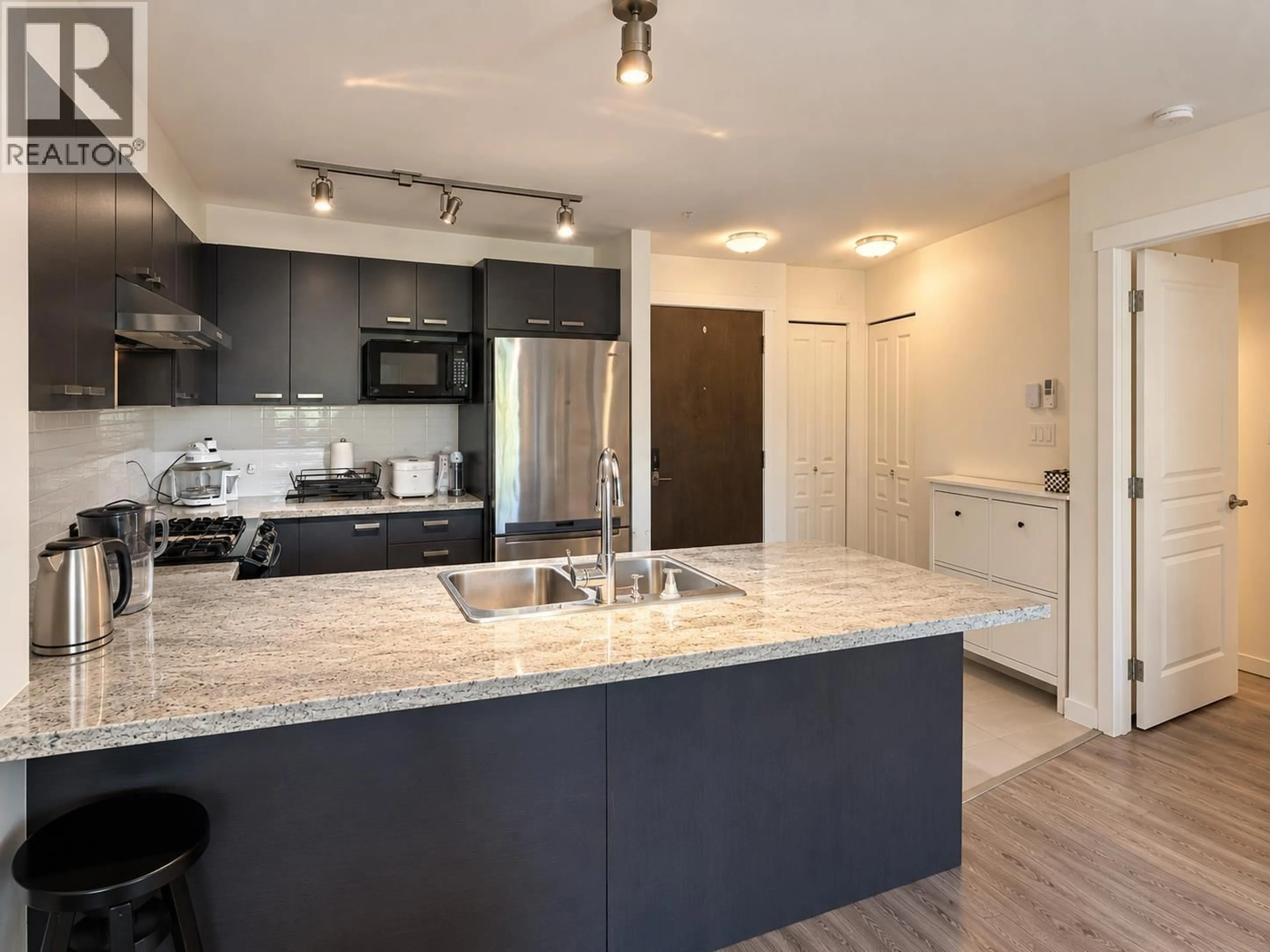 Open concept kitchen, unknown for 218 - 9399 TOMICKI AVENUE, Richmond British Columbia V6X0H6