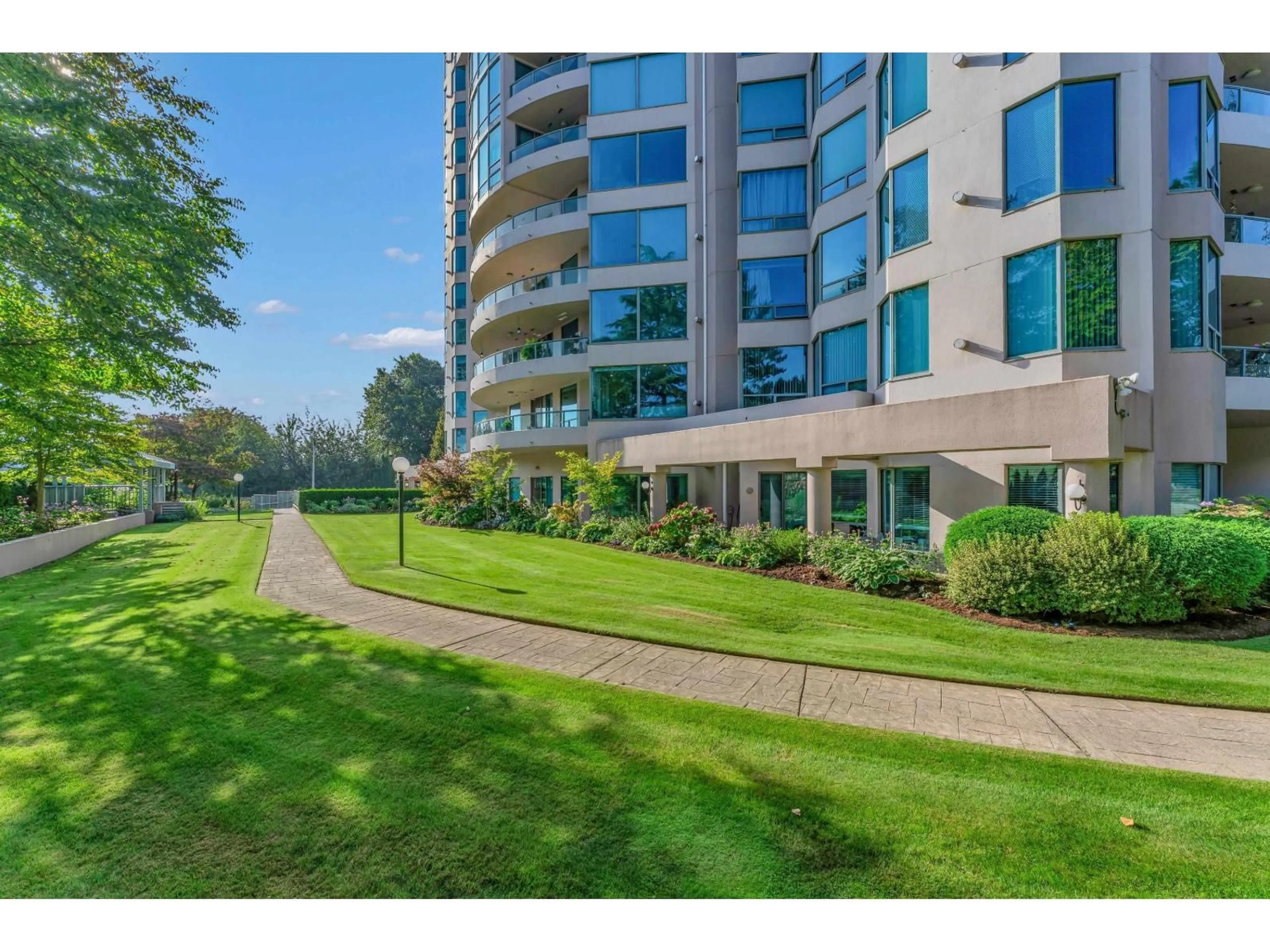 A pic from outside/outdoor area/front of a property/back of a property/a pic from drone, water/lake/river/ocean view for 801 - 33065 MILL LAKE ROAD, Abbotsford British Columbia V2S8E6