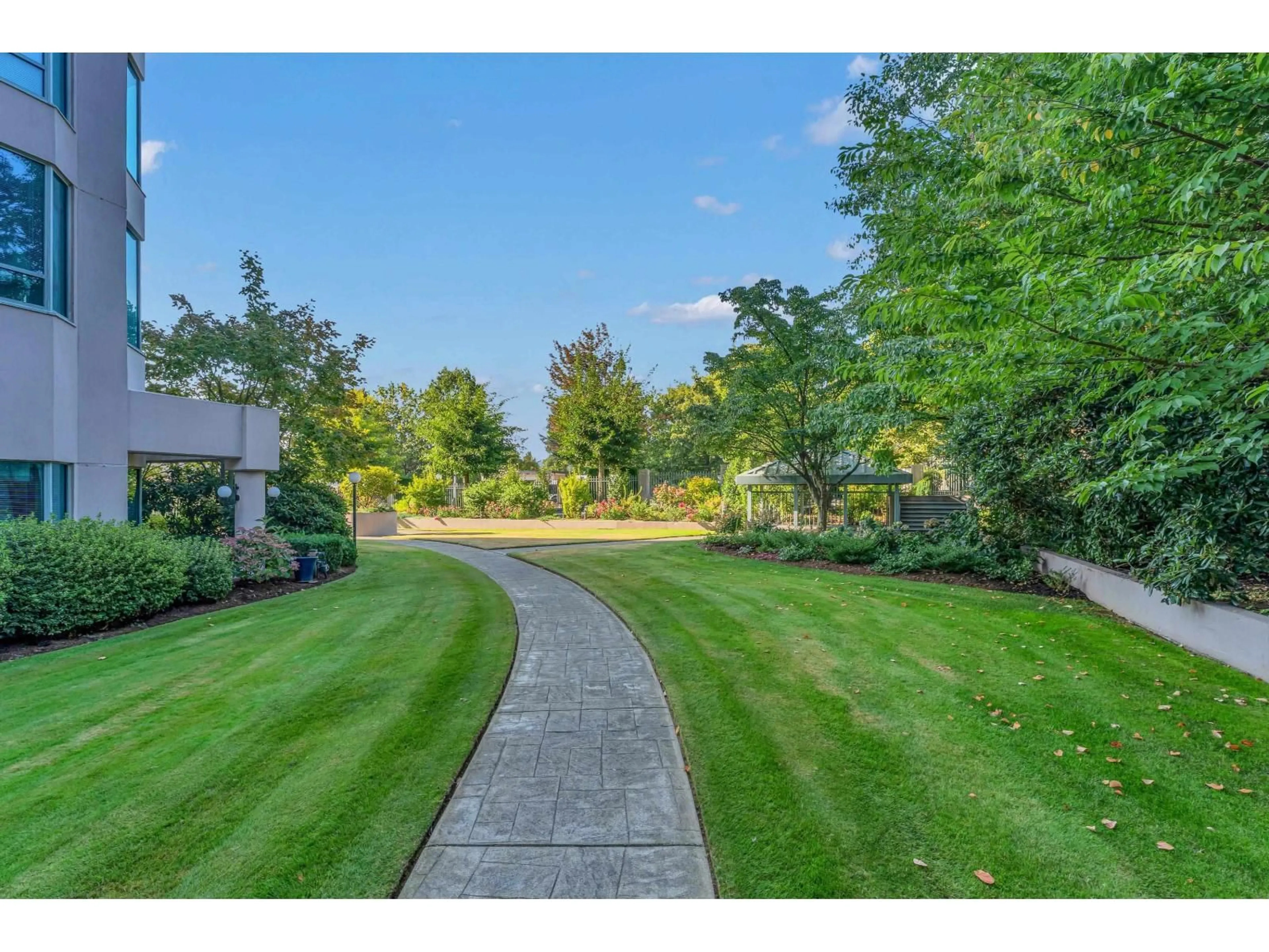 A pic from outside/outdoor area/front of a property/back of a property/a pic from drone, water/lake/river/ocean view for 801 - 33065 MILL LAKE ROAD, Abbotsford British Columbia V2S8E6