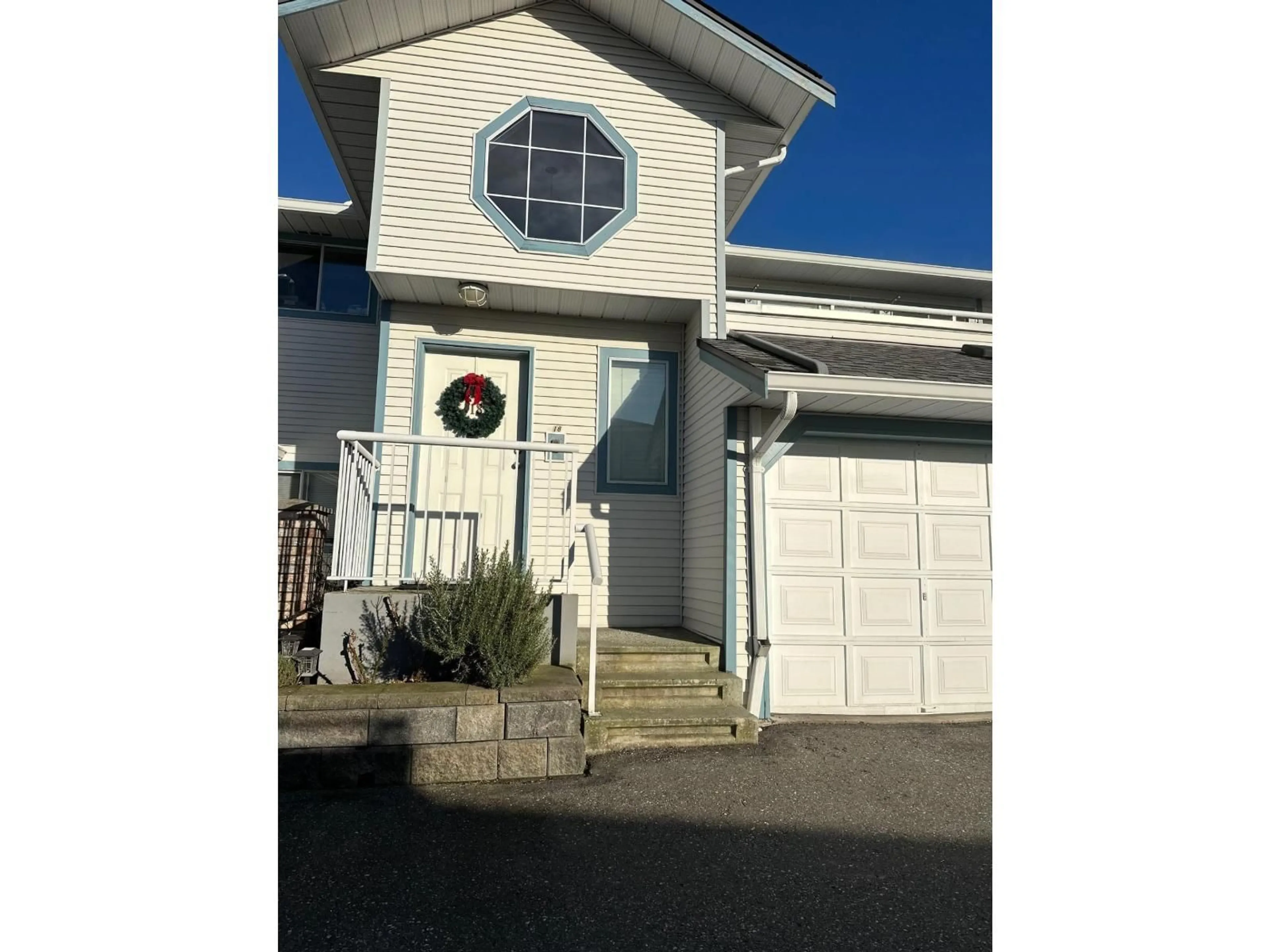 Home with vinyl exterior material, street for 18 - 19797 64 AVENUE, Langley British Columbia V2Y1G9