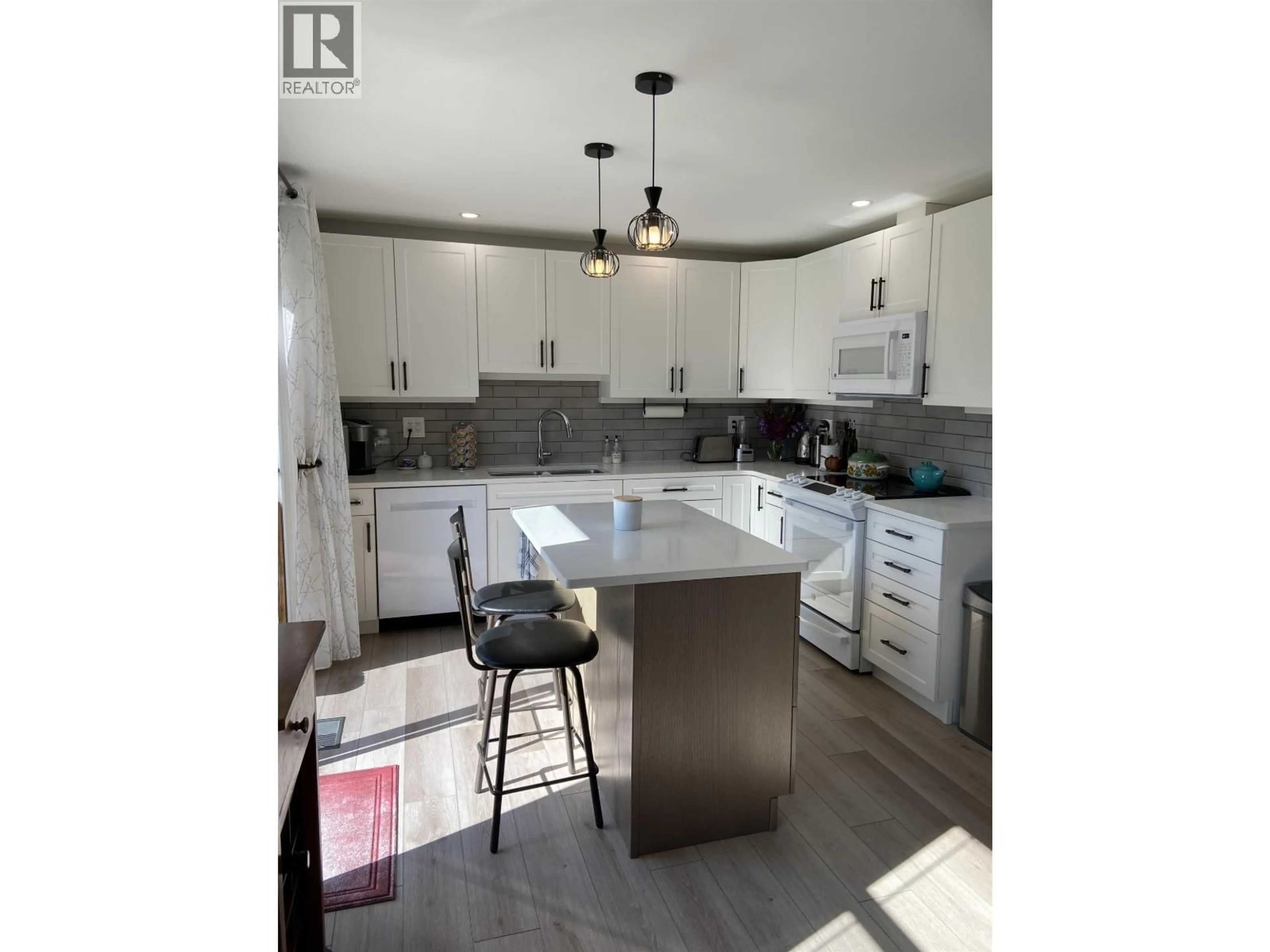 Open concept kitchen, unknown for 4719 OLSON AVENUE, Terrace British Columbia V8G2A4