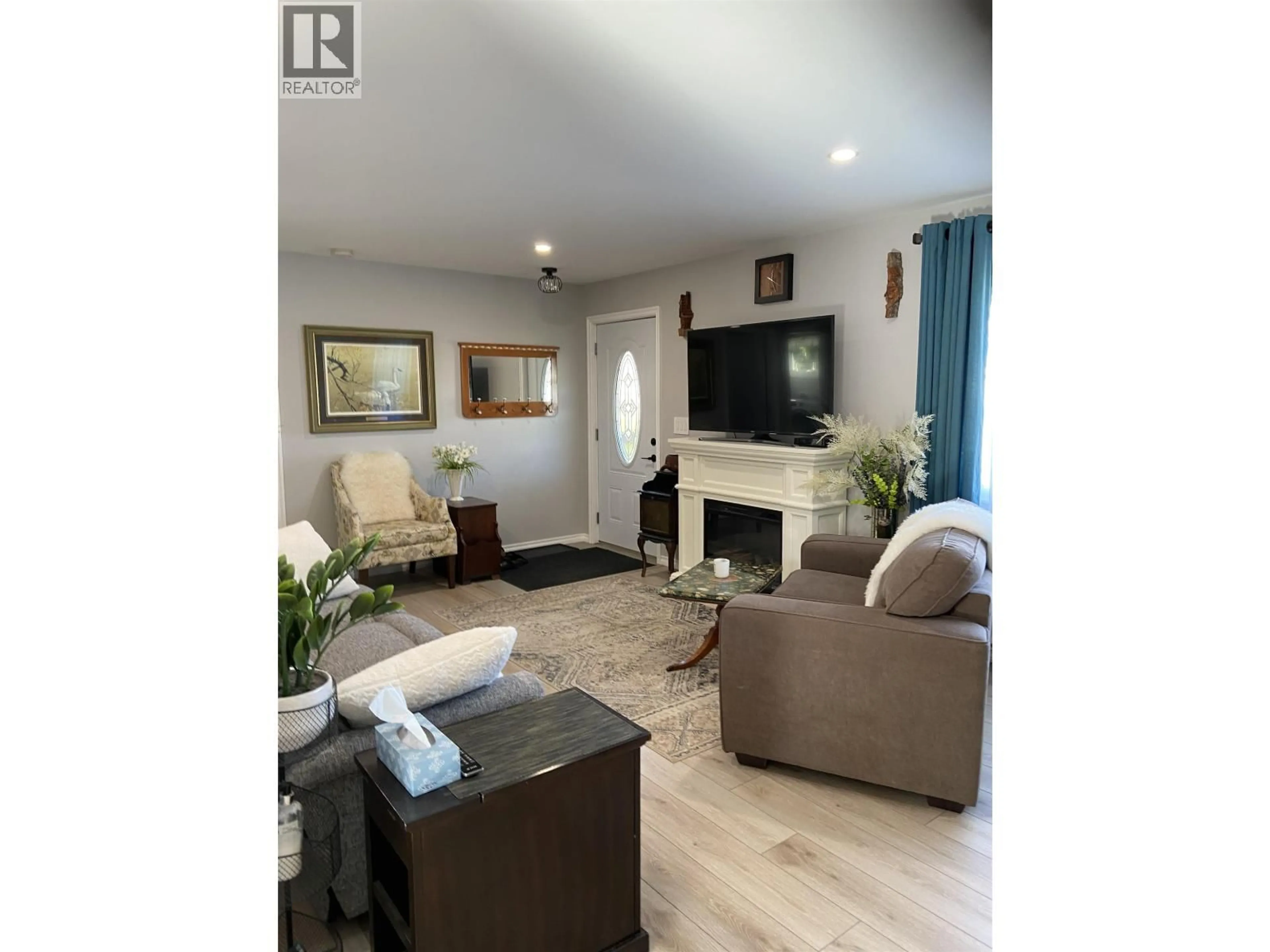 Living room with furniture, wood/laminate floor for 4719 OLSON AVENUE, Terrace British Columbia V8G2A4