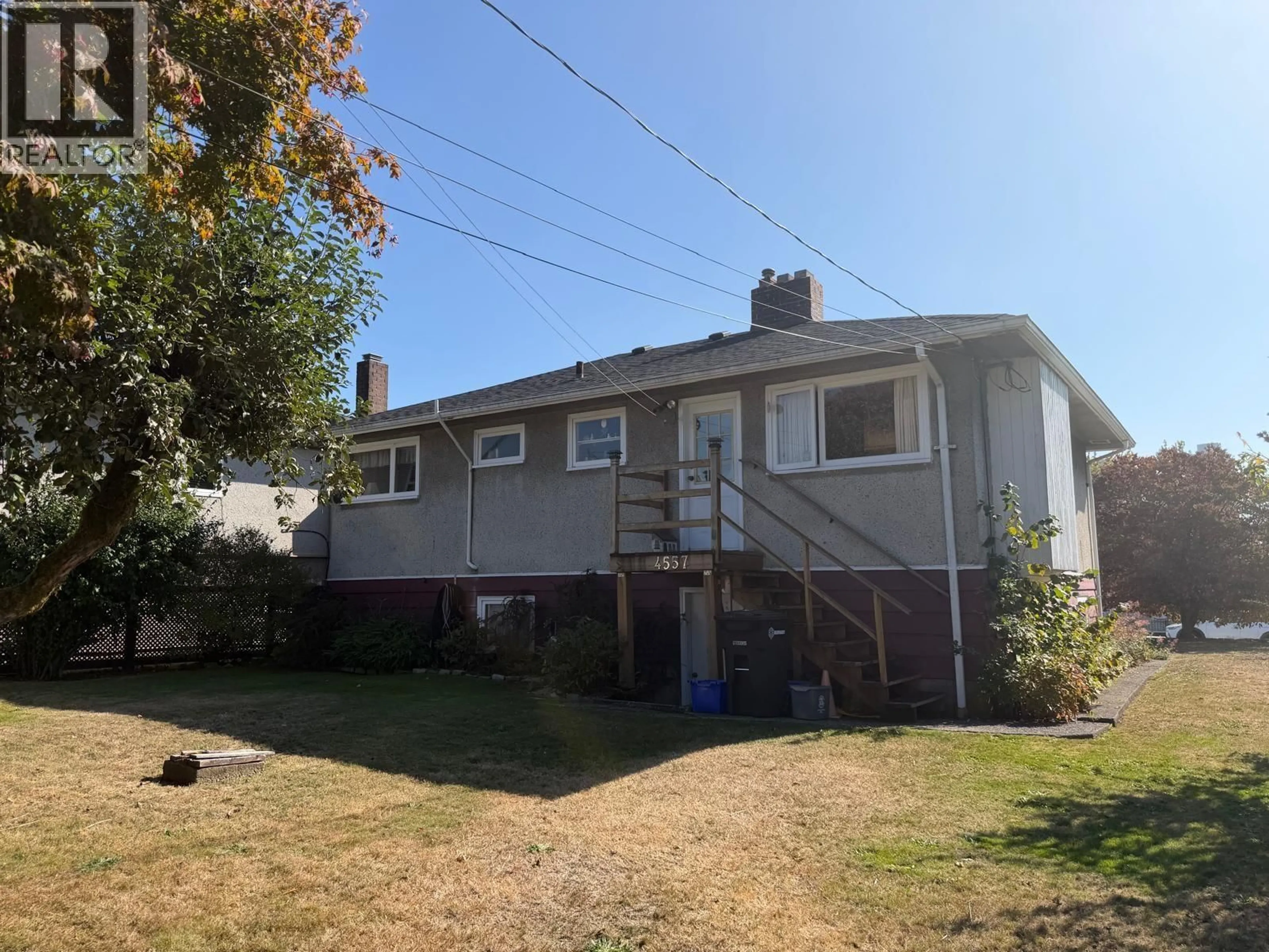 A pic from outside/outdoor area/front of a property/back of a property/a pic from drone, street for 4557 VENABLES STREET, Burnaby British Columbia V5C3A6