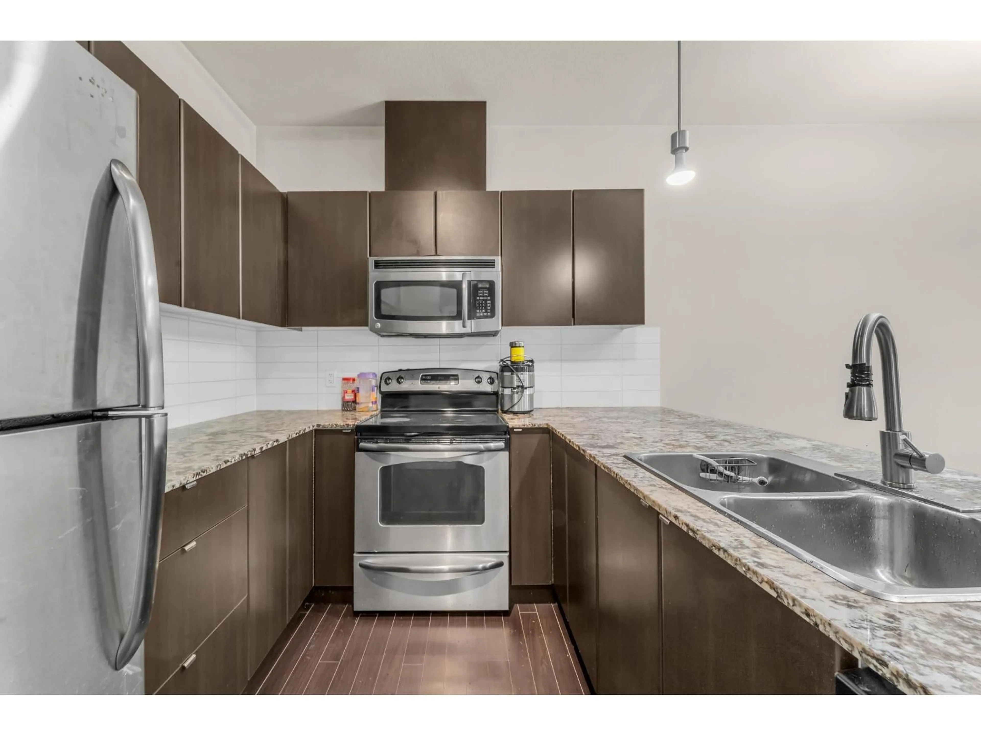 Standard kitchen, unknown for 409 - 9655 KING GEORGE BOULEVARD, Surrey British Columbia V3T0C7