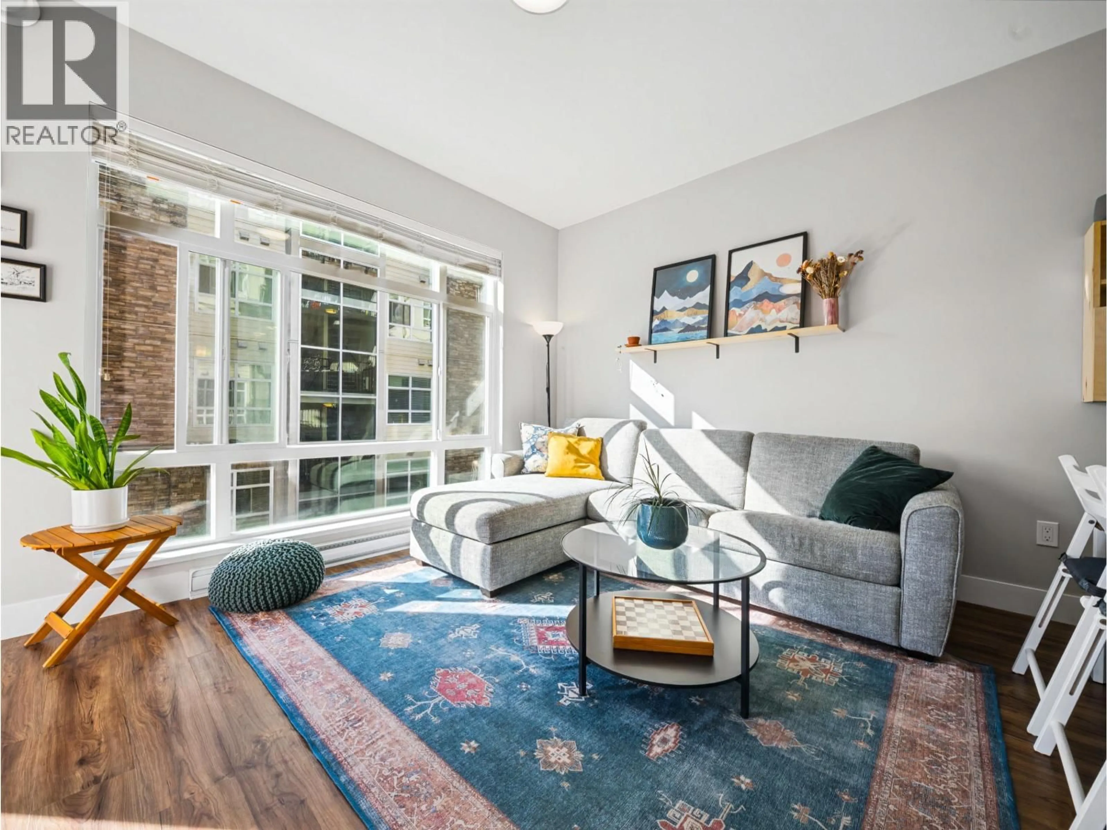 Living room with furniture, unknown for 301 - 2465 WILSON AVENUE, Port Coquitlam British Columbia V3C0E6