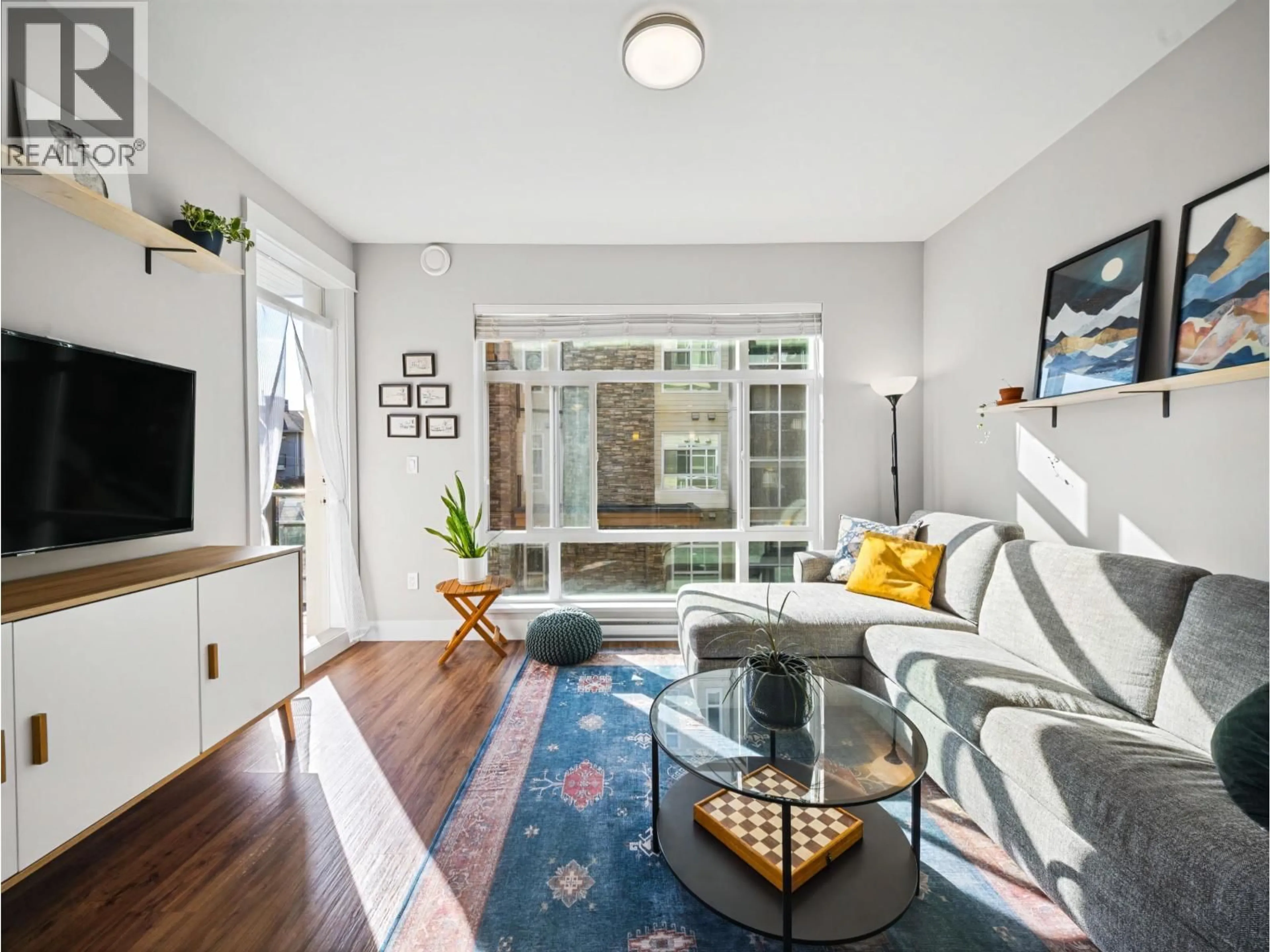 Living room with furniture, unknown for 301 - 2465 WILSON AVENUE, Port Coquitlam British Columbia V3C0E6