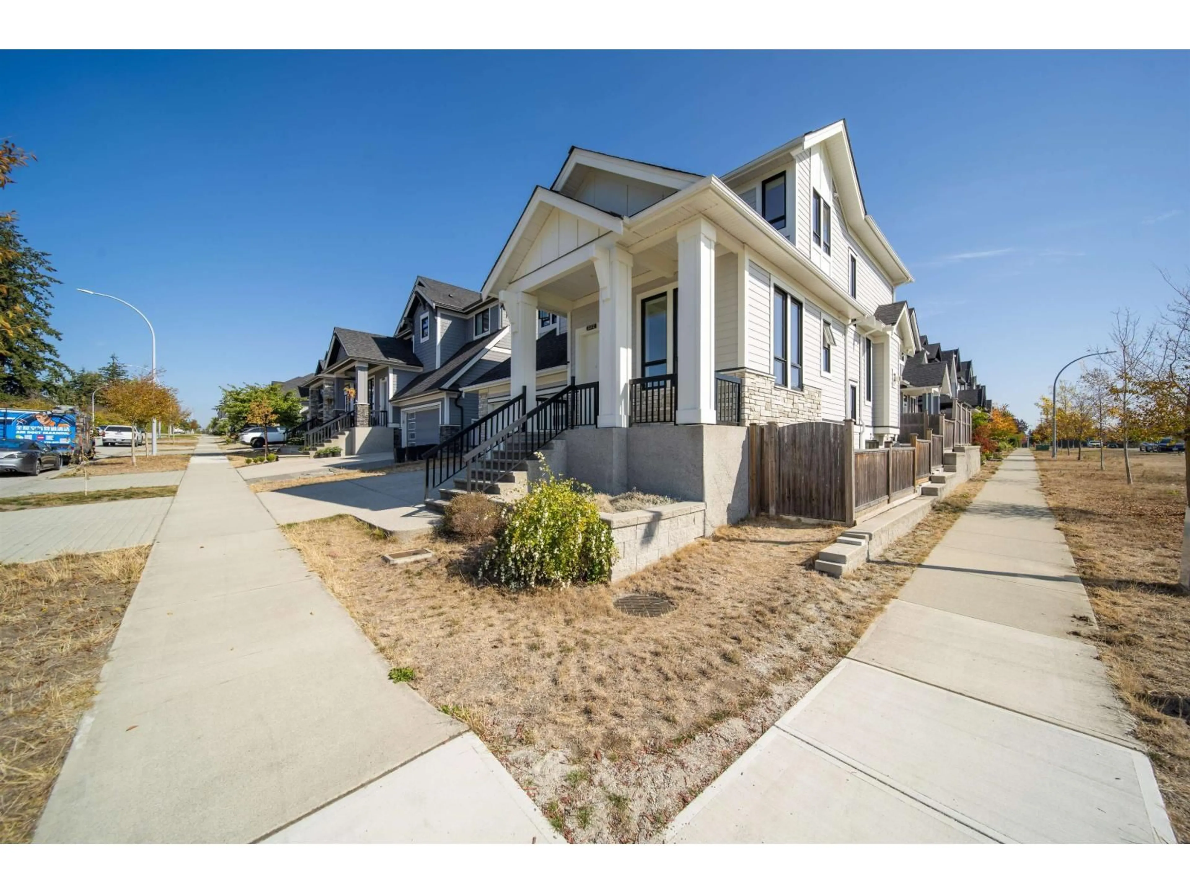 Home with vinyl exterior material, street for 2112 166 STREET, Surrey British Columbia V3Z9X9