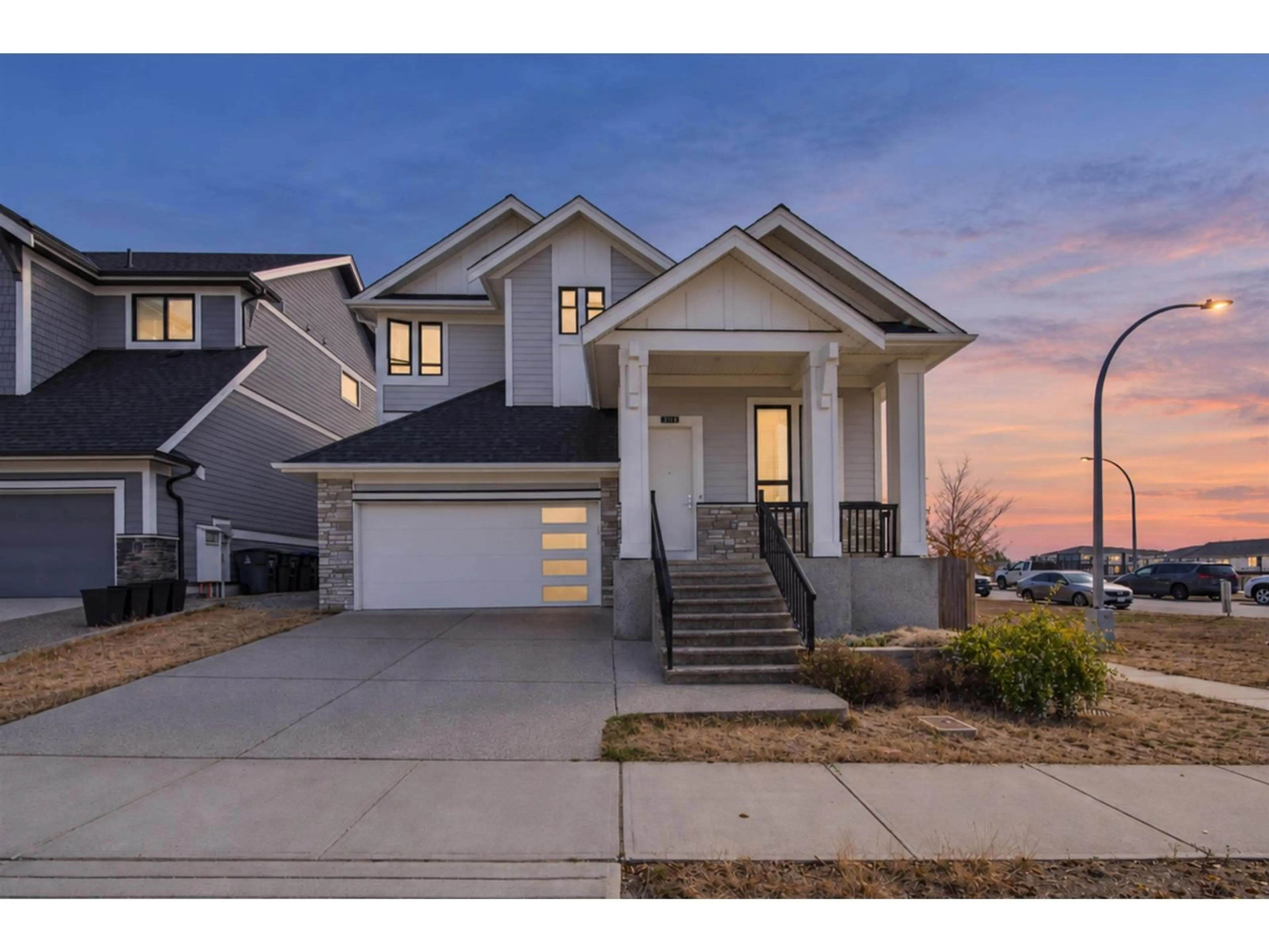 Home with vinyl exterior material, street for 2112 166 STREET, Surrey British Columbia V3Z9X9