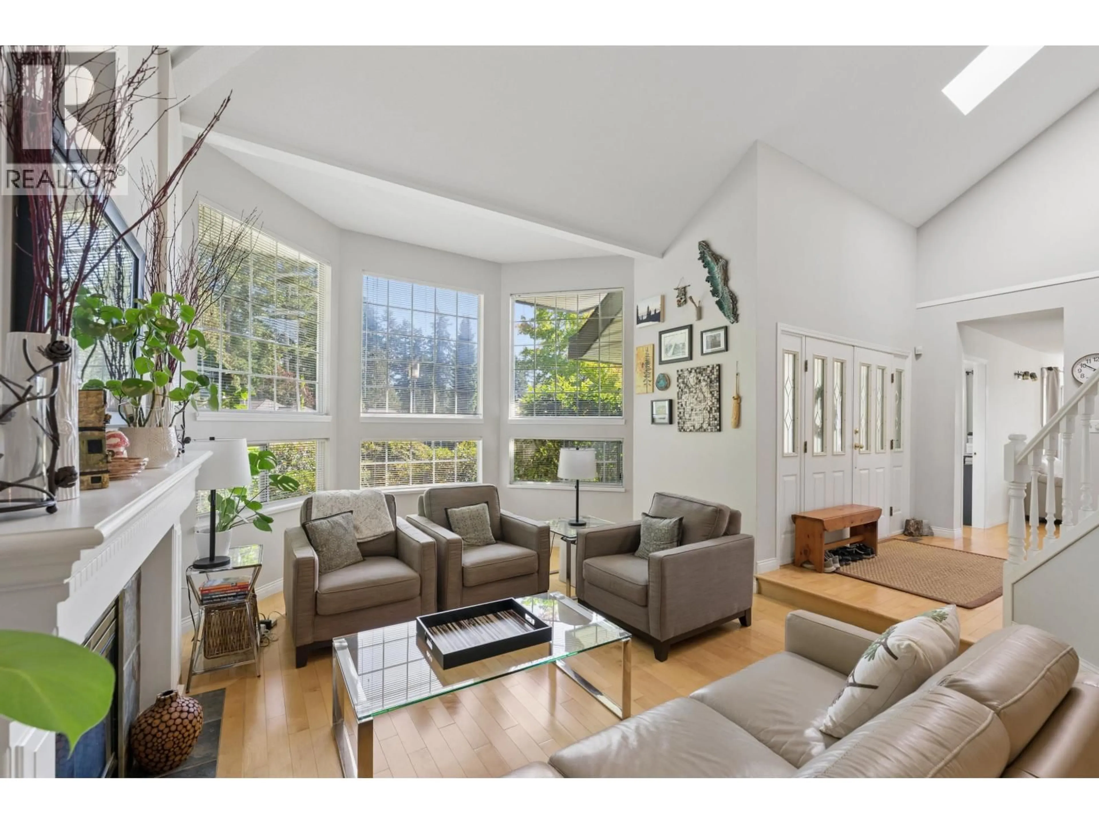 Living room with furniture, wood/laminate floor for 13 TIMBERCREST DRIVE, Port Moody British Columbia V3H4T6