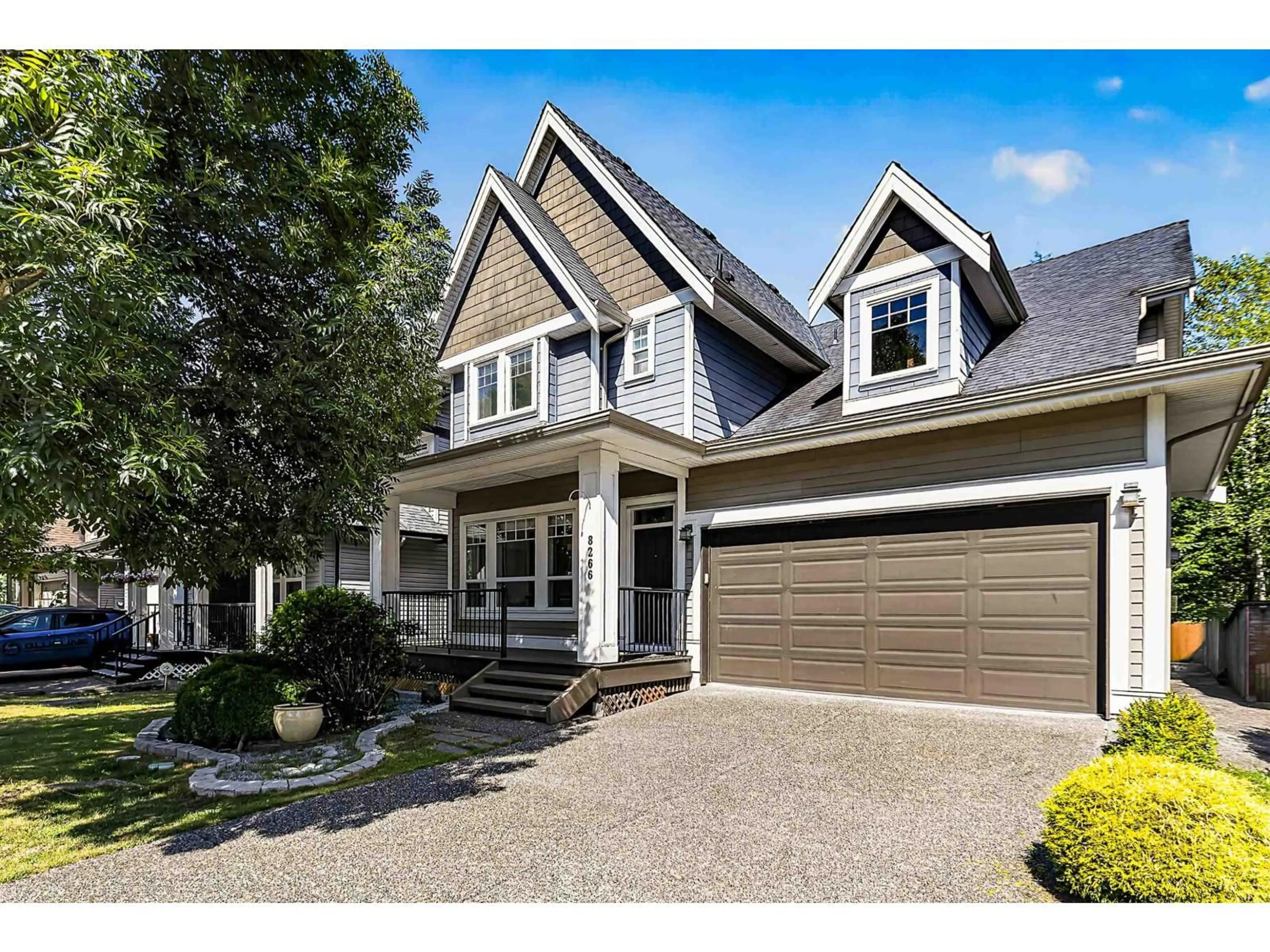Home with vinyl exterior material, street for 8266 211 STREET, Langley British Columbia V2Y0E4