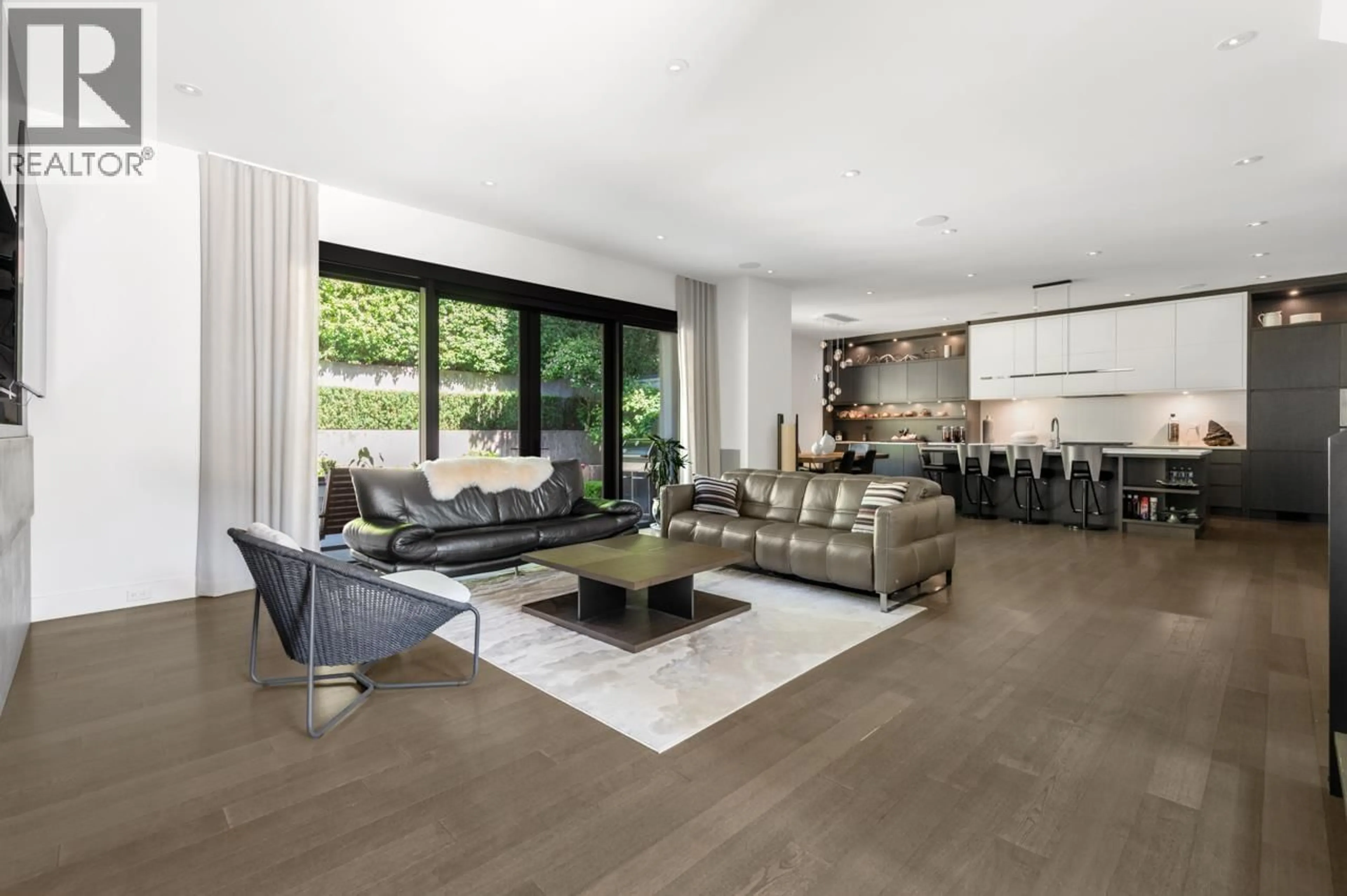 Living room with furniture, wood/laminate floor for 3430 AINTREE DRIVE, North Vancouver British Columbia V7R4E3
