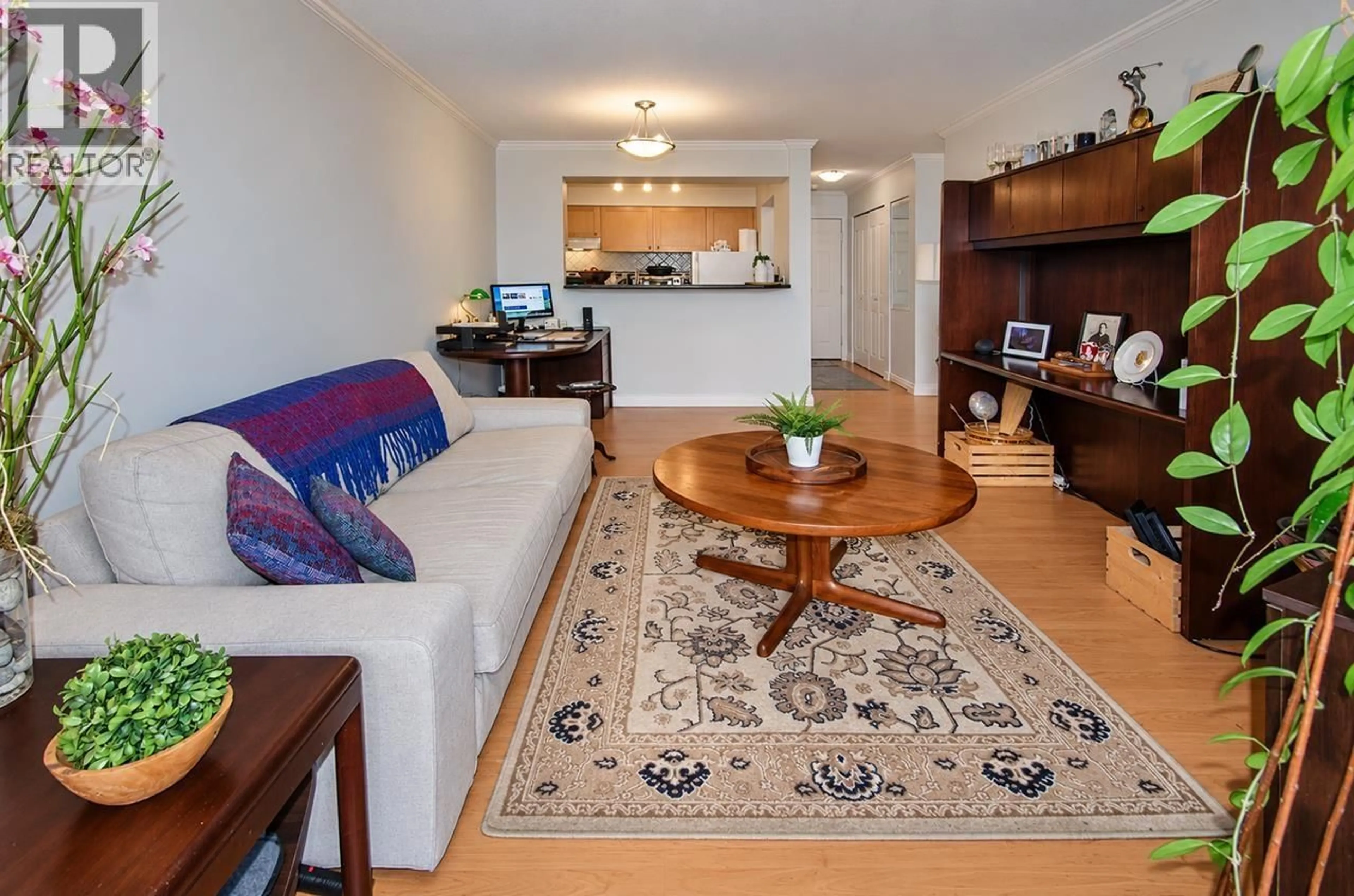 Living room with furniture, wood/laminate floor for 107 - 360 2ND STREET, North Vancouver British Columbia V7L4N6