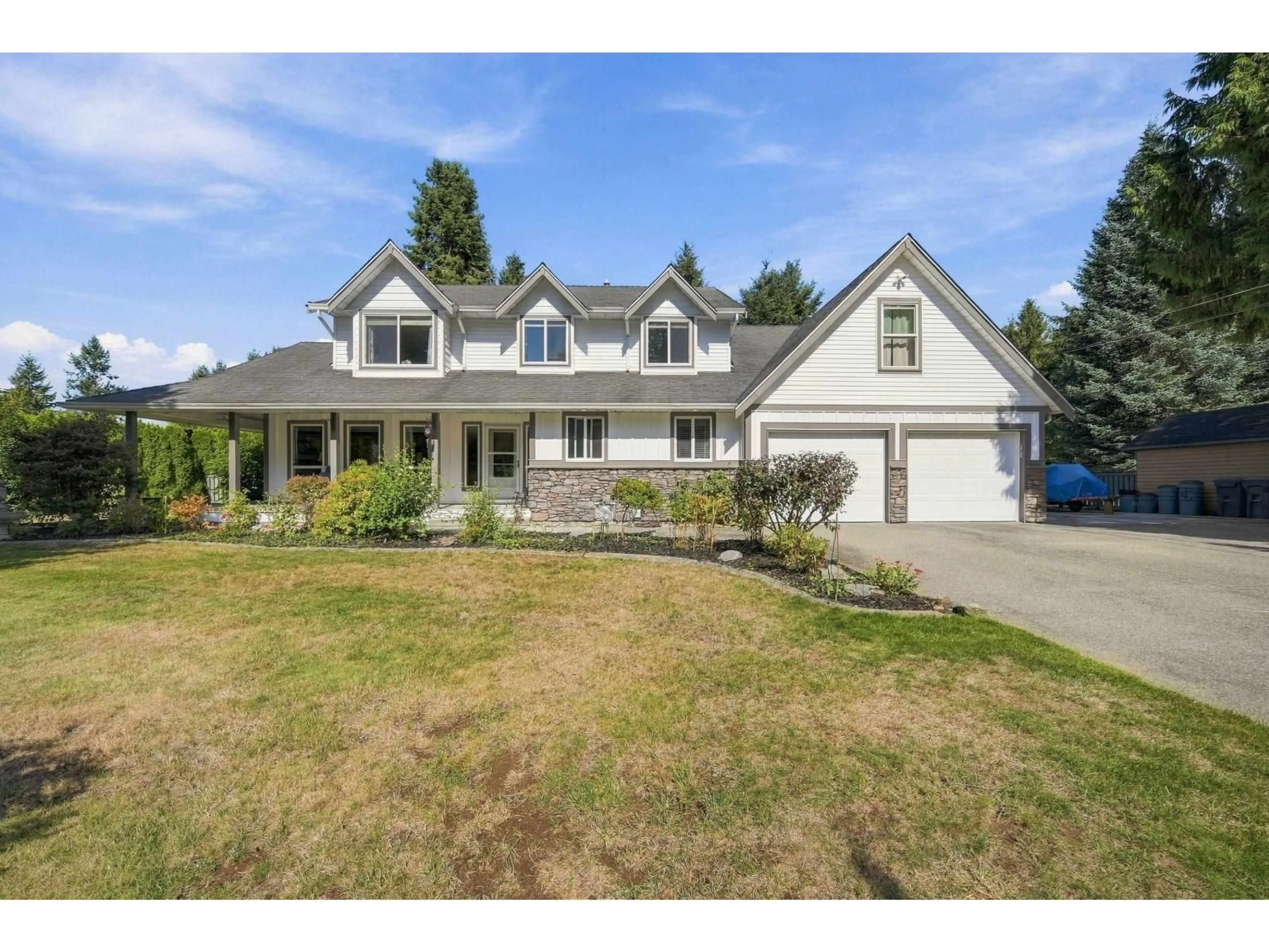 Home with vinyl exterior material, street for 23887 62 AVENUE, Langley British Columbia V2Y1M2
