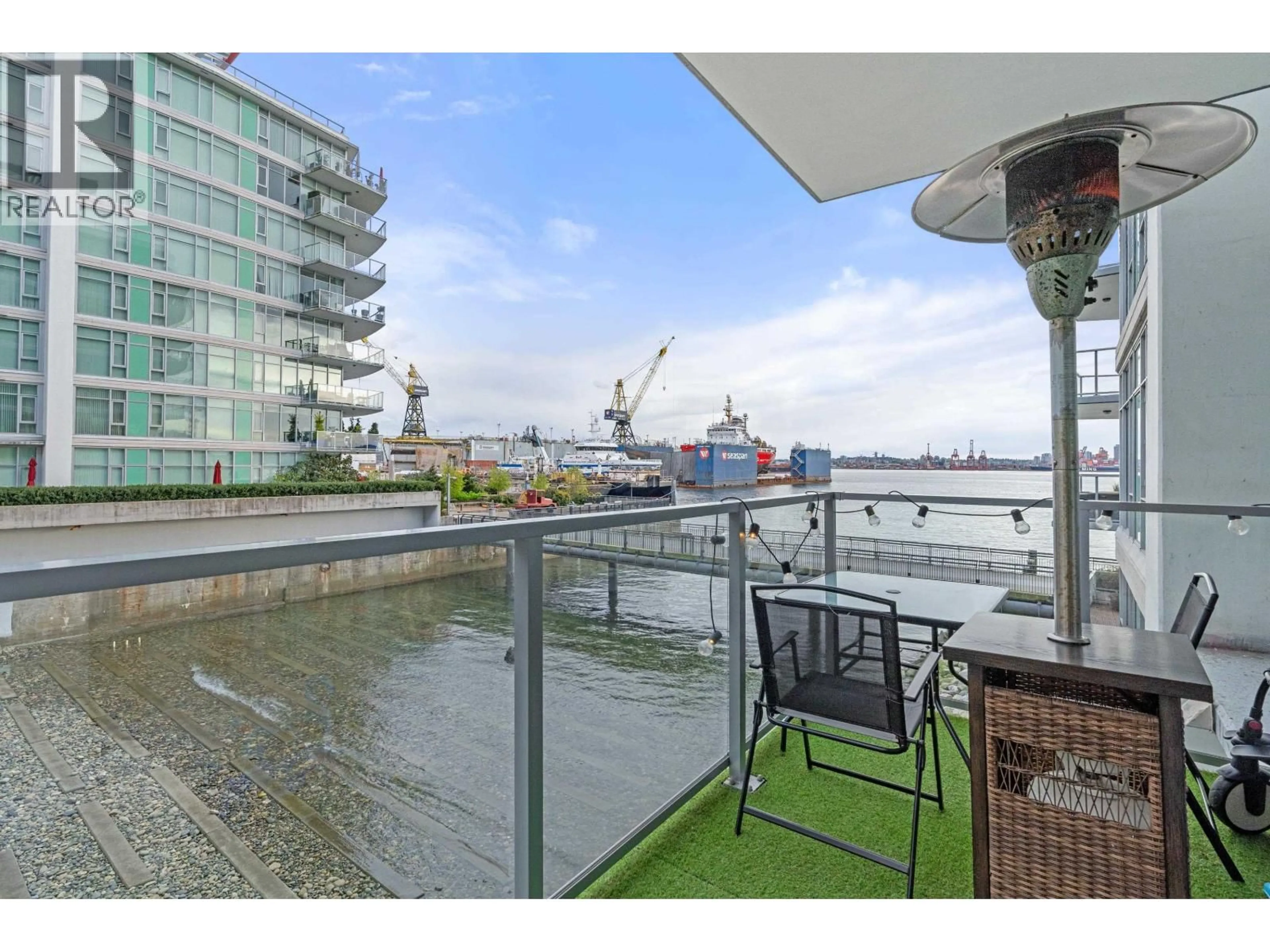 Patio, water/lake/river/ocean view for 204 - 175 VICTORY SHIP WAY, North Vancouver British Columbia V7L0G1