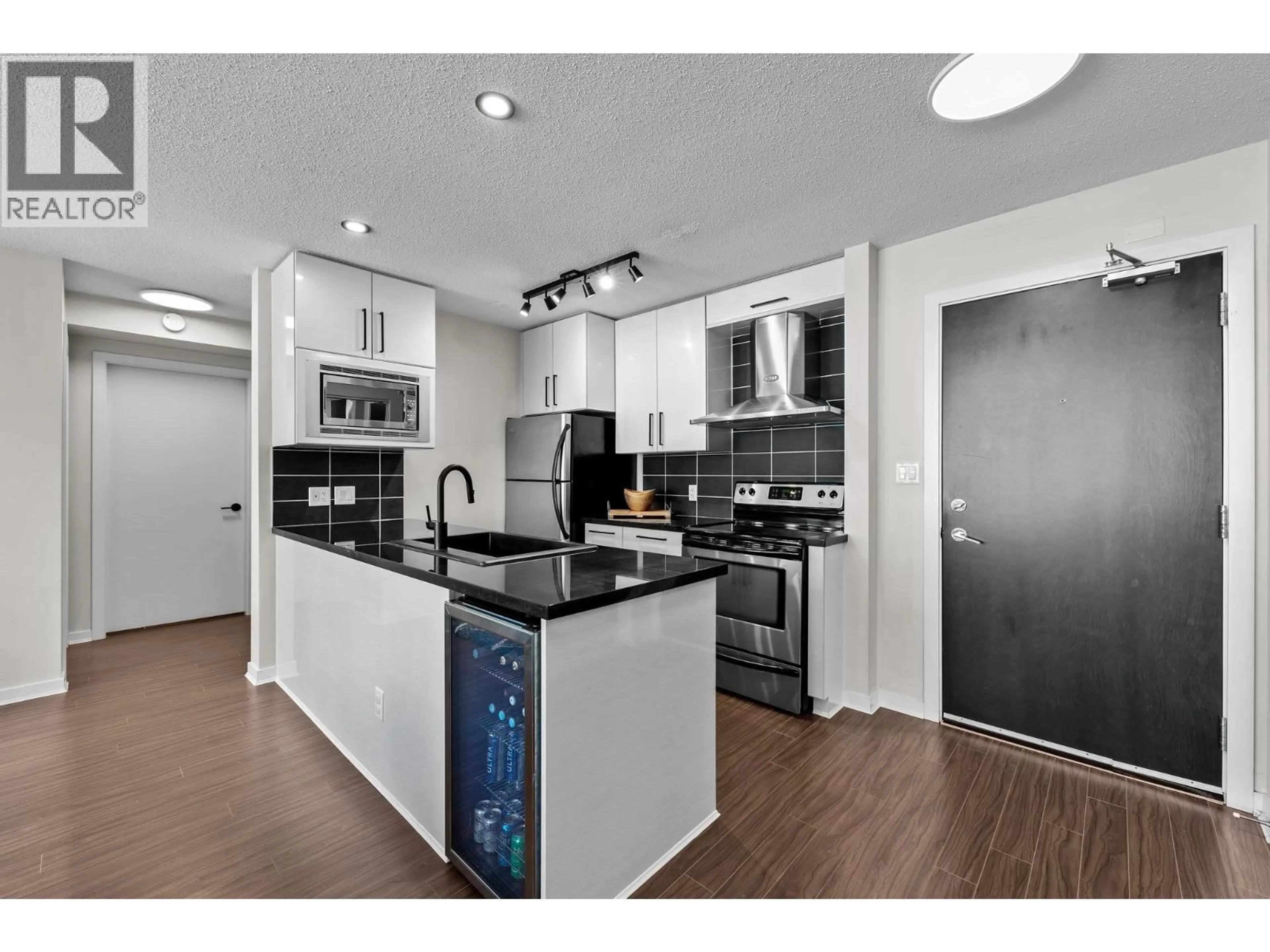 Open concept kitchen, unknown for 306 - 633 ABBOTT STREET, Vancouver British Columbia V6B0J3