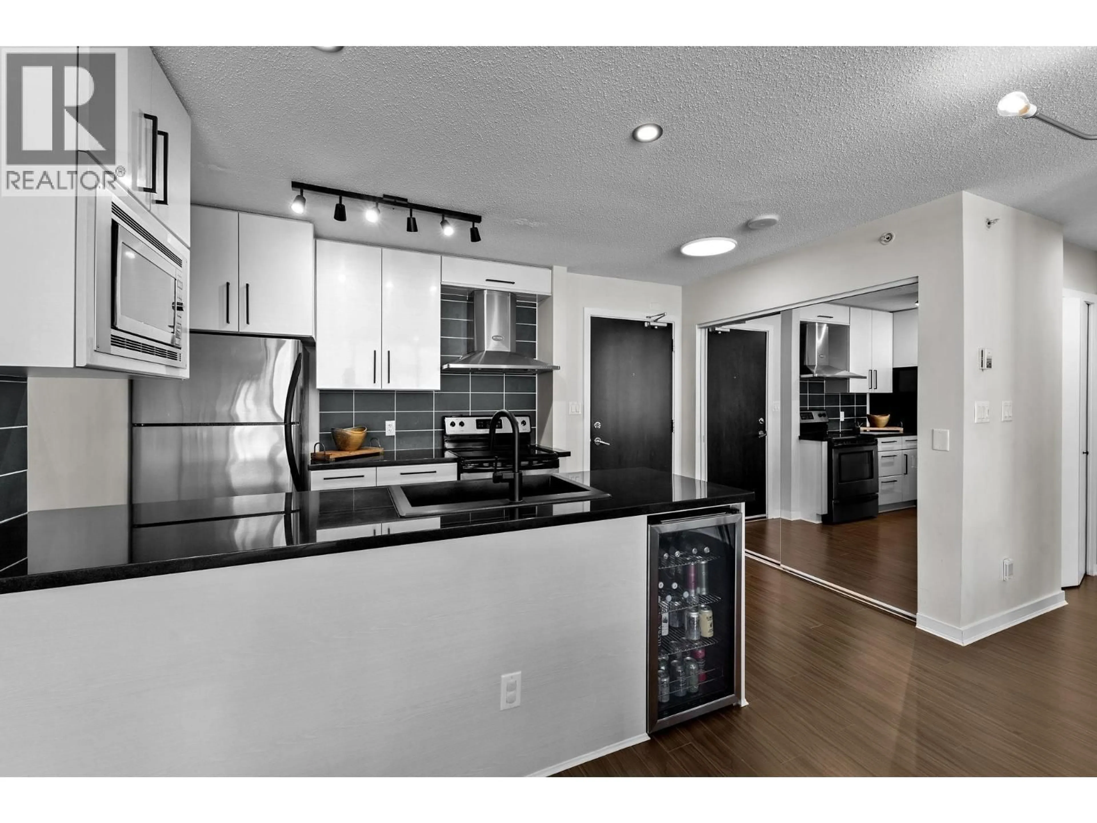 Open concept kitchen, unknown for 306 - 633 ABBOTT STREET, Vancouver British Columbia V6B0J3