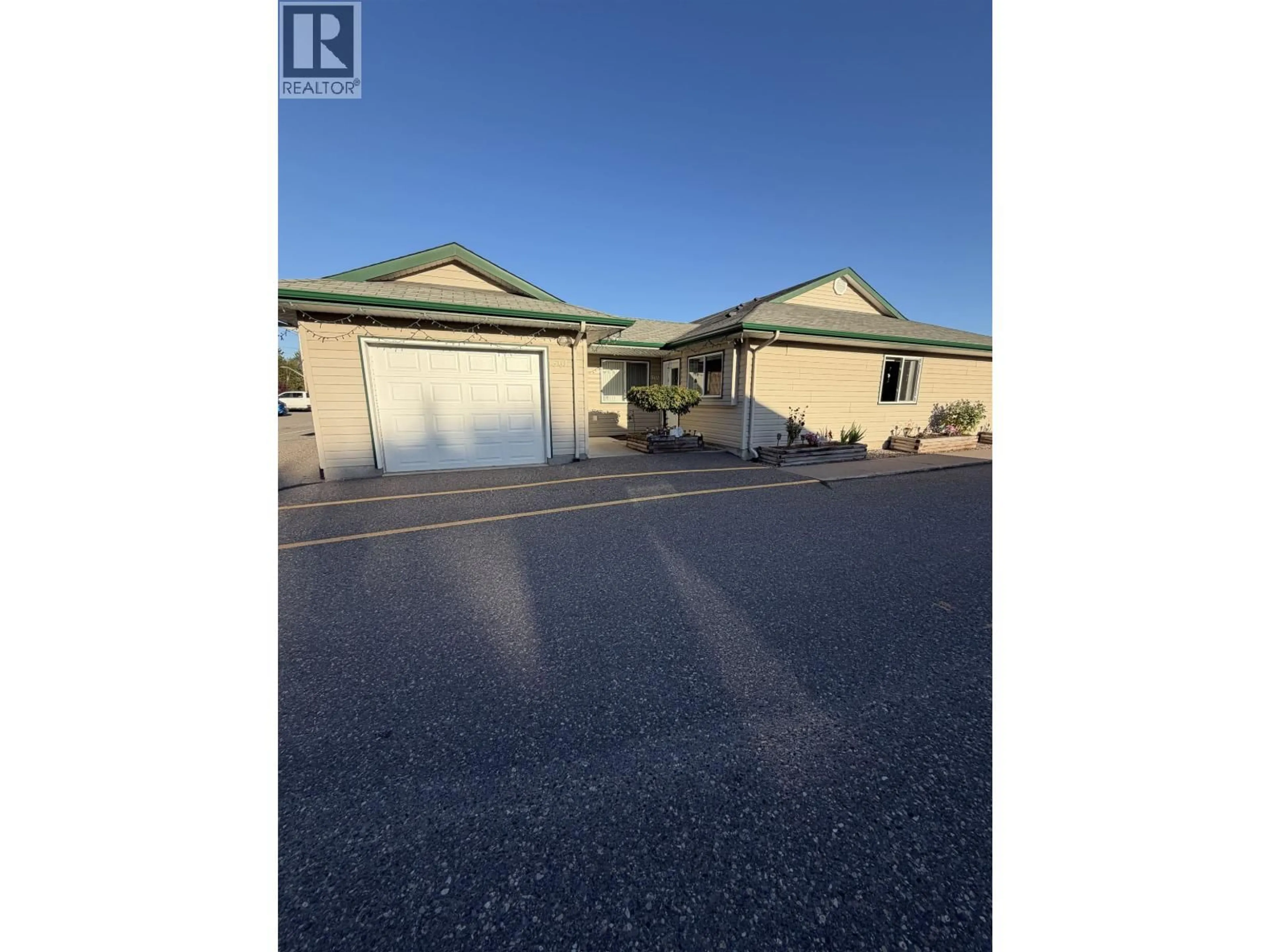 A pic from outside/outdoor area/front of a property/back of a property/a pic from drone, street for 501 - 2889 FERRY AVENUE, Prince George British Columbia V2N1L3