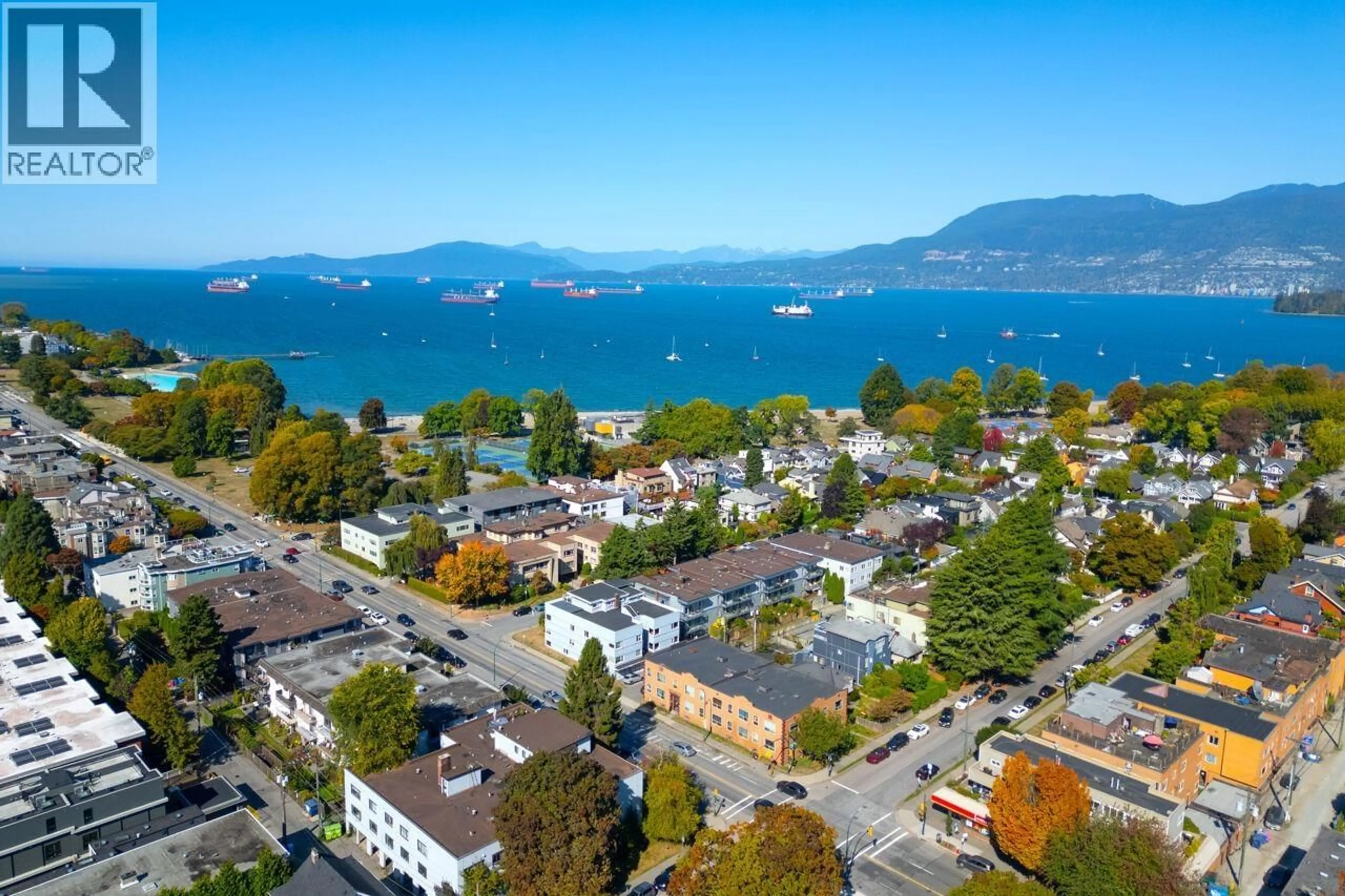 A pic from outside/outdoor area/front of a property/back of a property/a pic from drone, water/lake/river/ocean view for 106 - 1450 LABURNUM STREET, Vancouver British Columbia V6J3W3