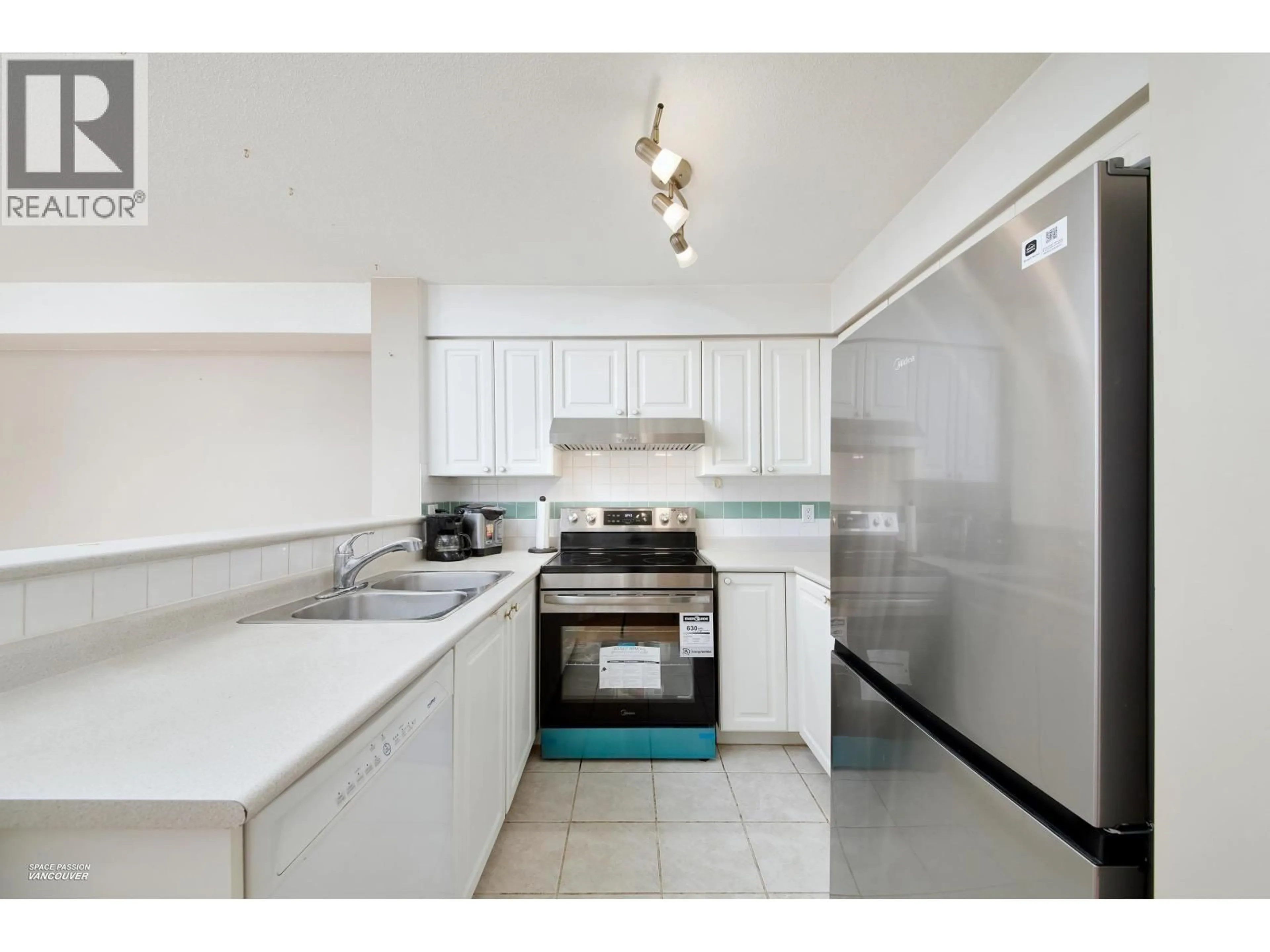Standard kitchen, ceramic/tile floor for 301 - 8989 HUDSON STREET, Vancouver British Columbia V6P6Y1