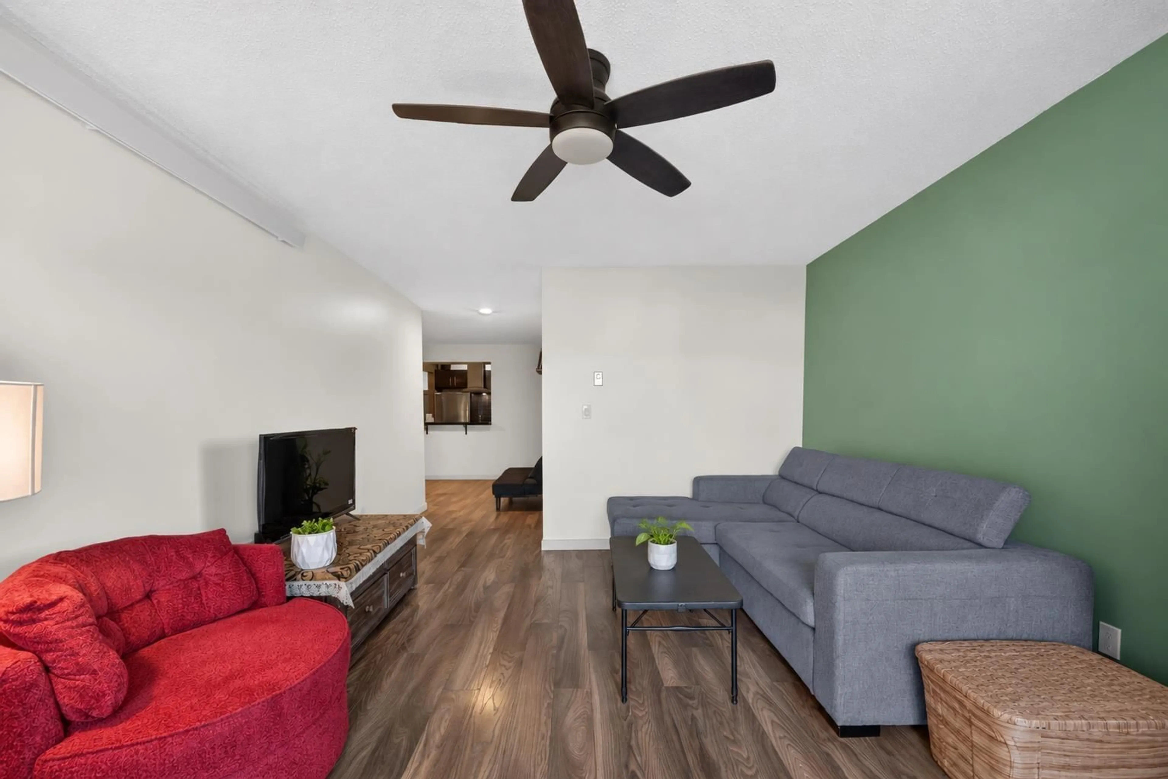 Living room with furniture, wood/laminate floor for 307 - 5906 176A STREET, Surrey British Columbia V3S4H7
