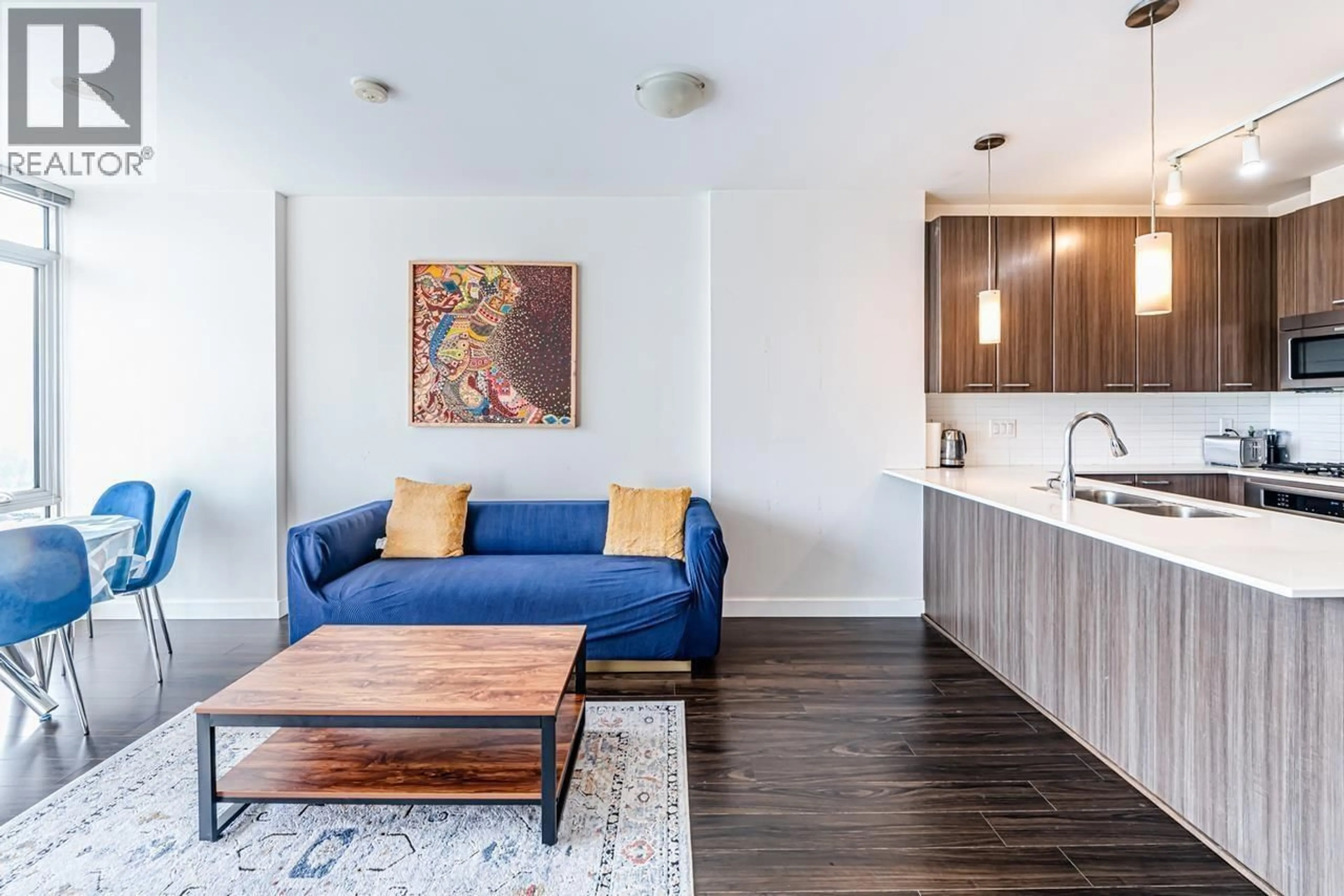 Living room with furniture, wood/laminate floor for 3103 - 2955 ATLANTIC AVENUE, Coquitlam British Columbia V3B0H9