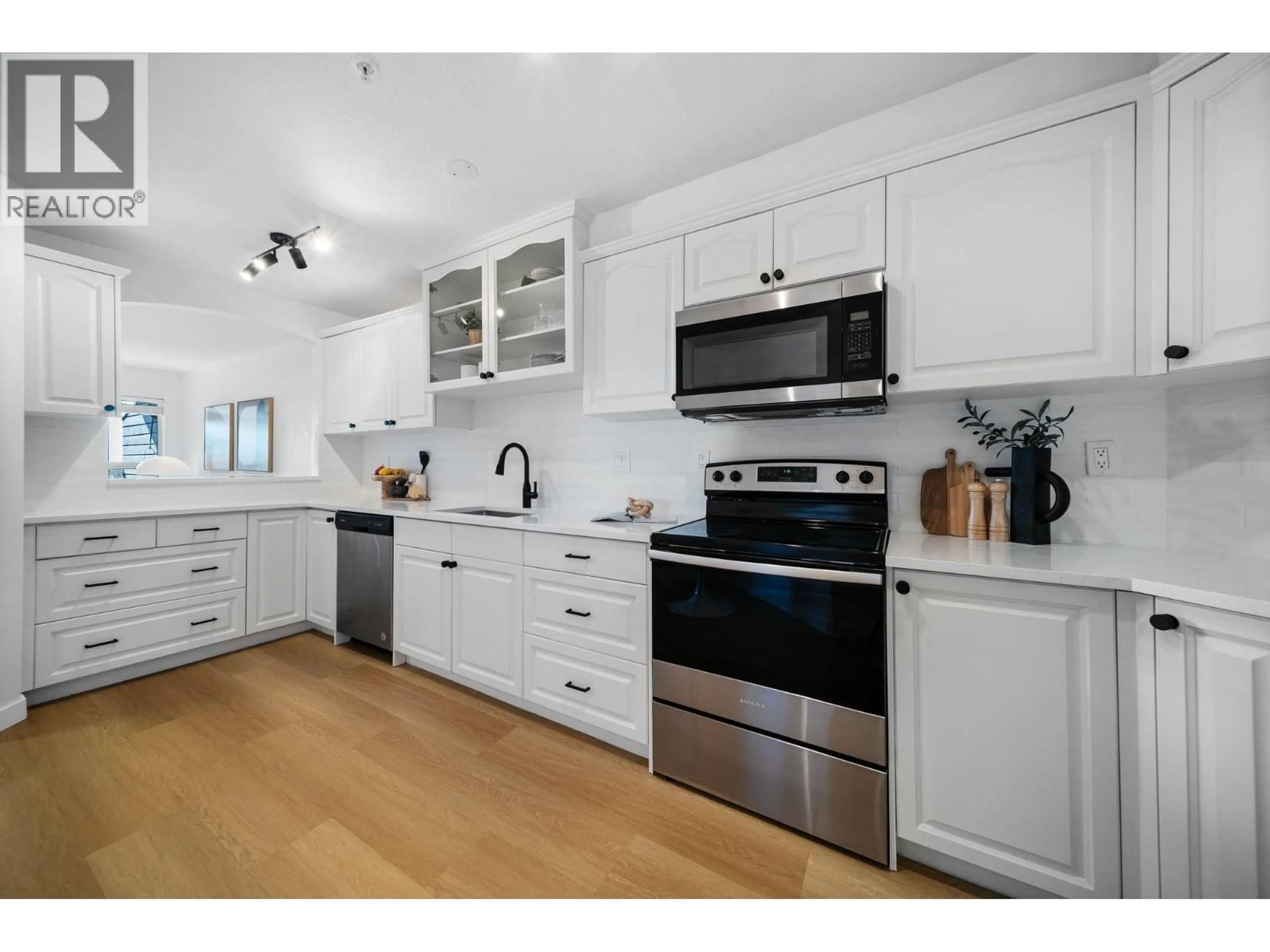 Open concept kitchen, unknown for 422 - 12931 RAILWAY AVENUE, Richmond British Columbia V7E6M5