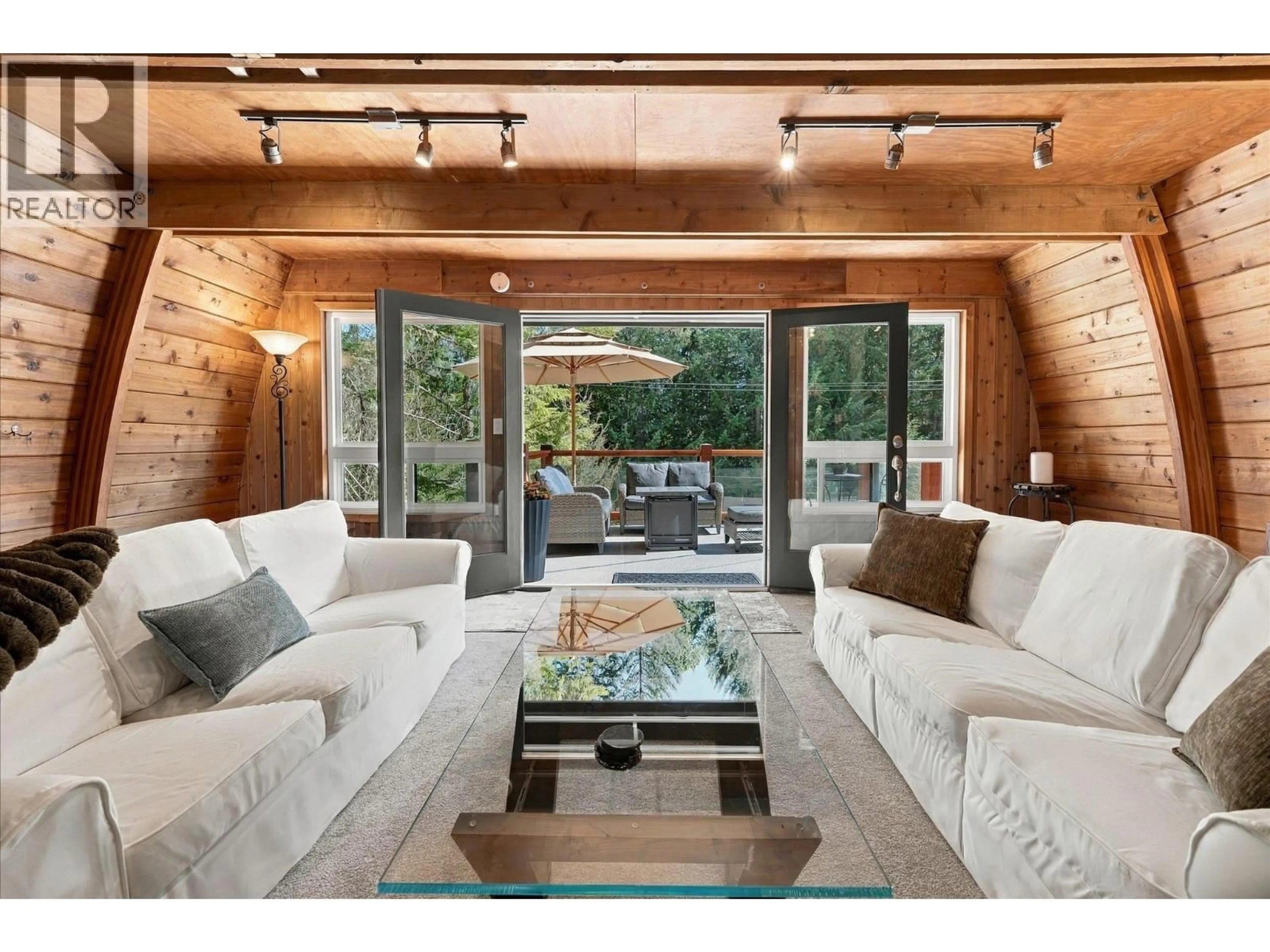 Living room with furniture, wood/laminate floor for 9226 EMERALD DRIVE, Whistler British Columbia V8E0G5
