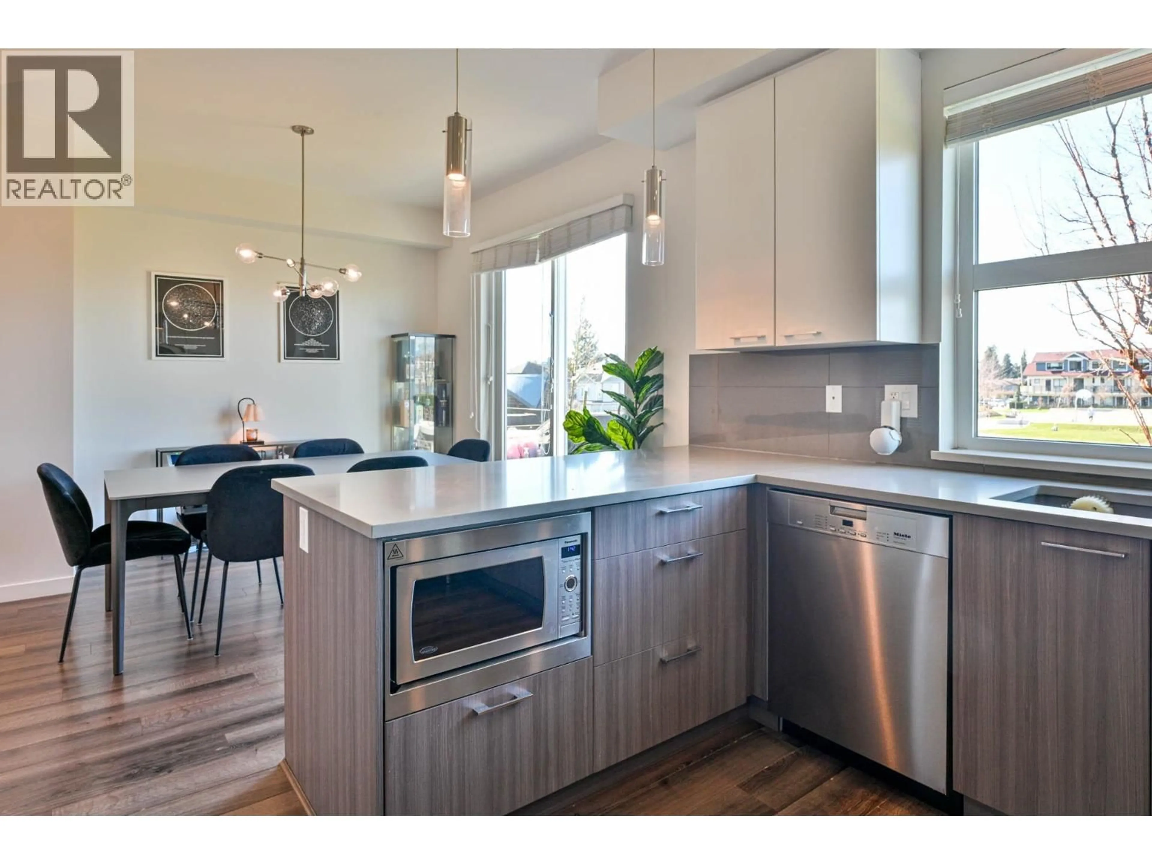 Open concept kitchen, wood/laminate floor for 84 - 10311 RIVER DRIVE, Richmond British Columbia V6X0T2