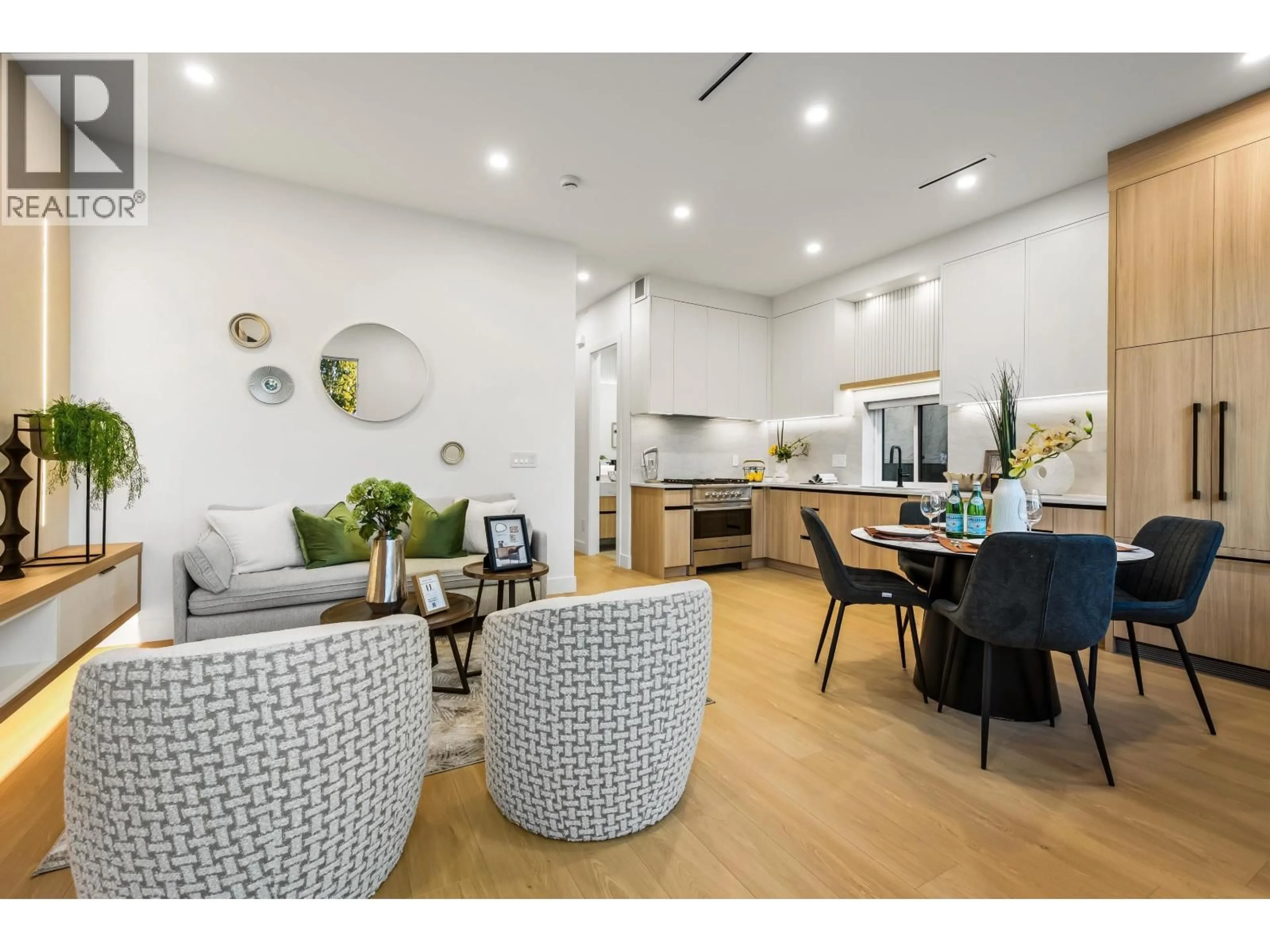 Open concept kitchen, wood/laminate floor for 1 - 3940 ETON STREET, Burnaby British Columbia V5C1J5