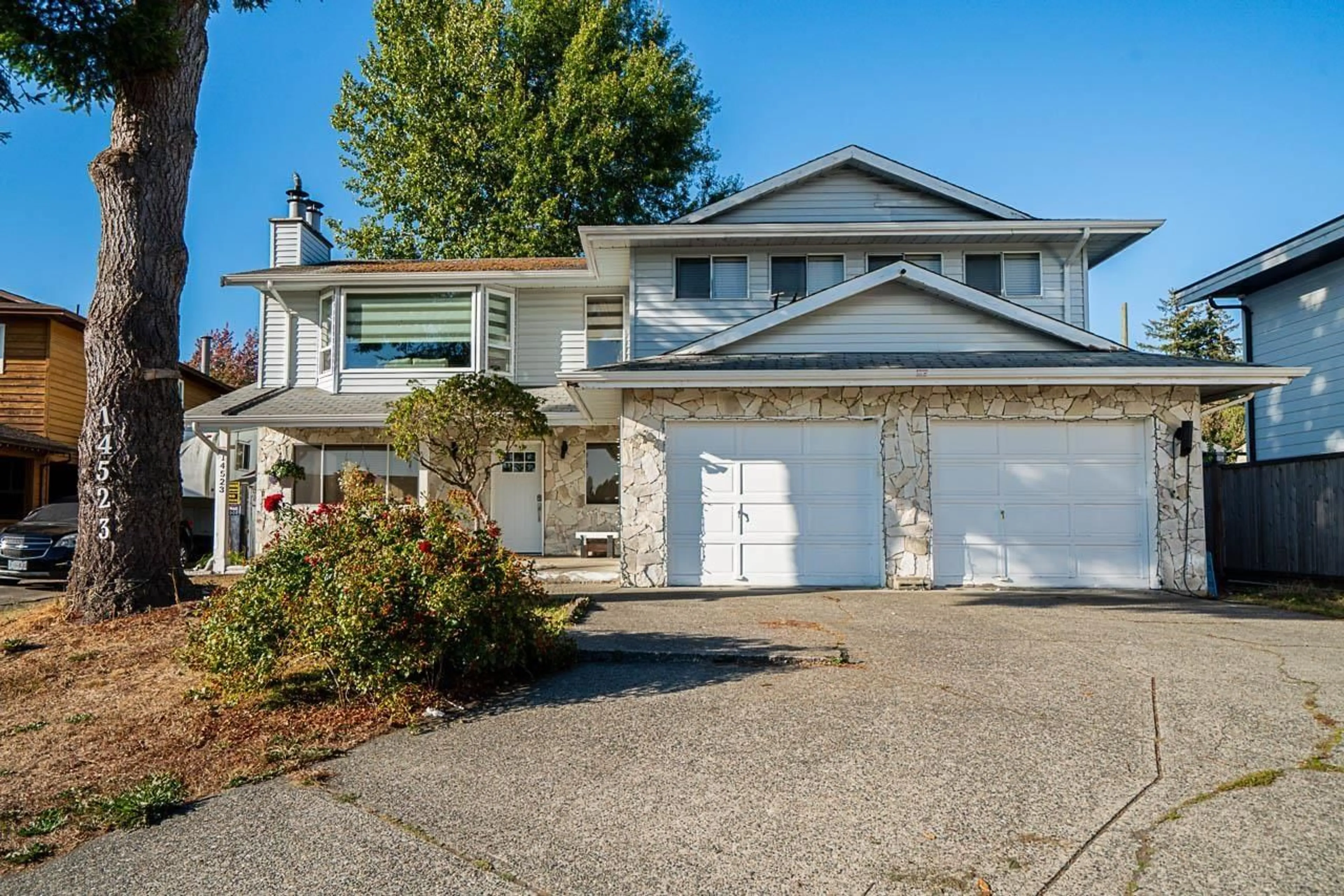 Home with vinyl exterior material, street for 14523 89 AVENUE, Surrey British Columbia V3R8B2