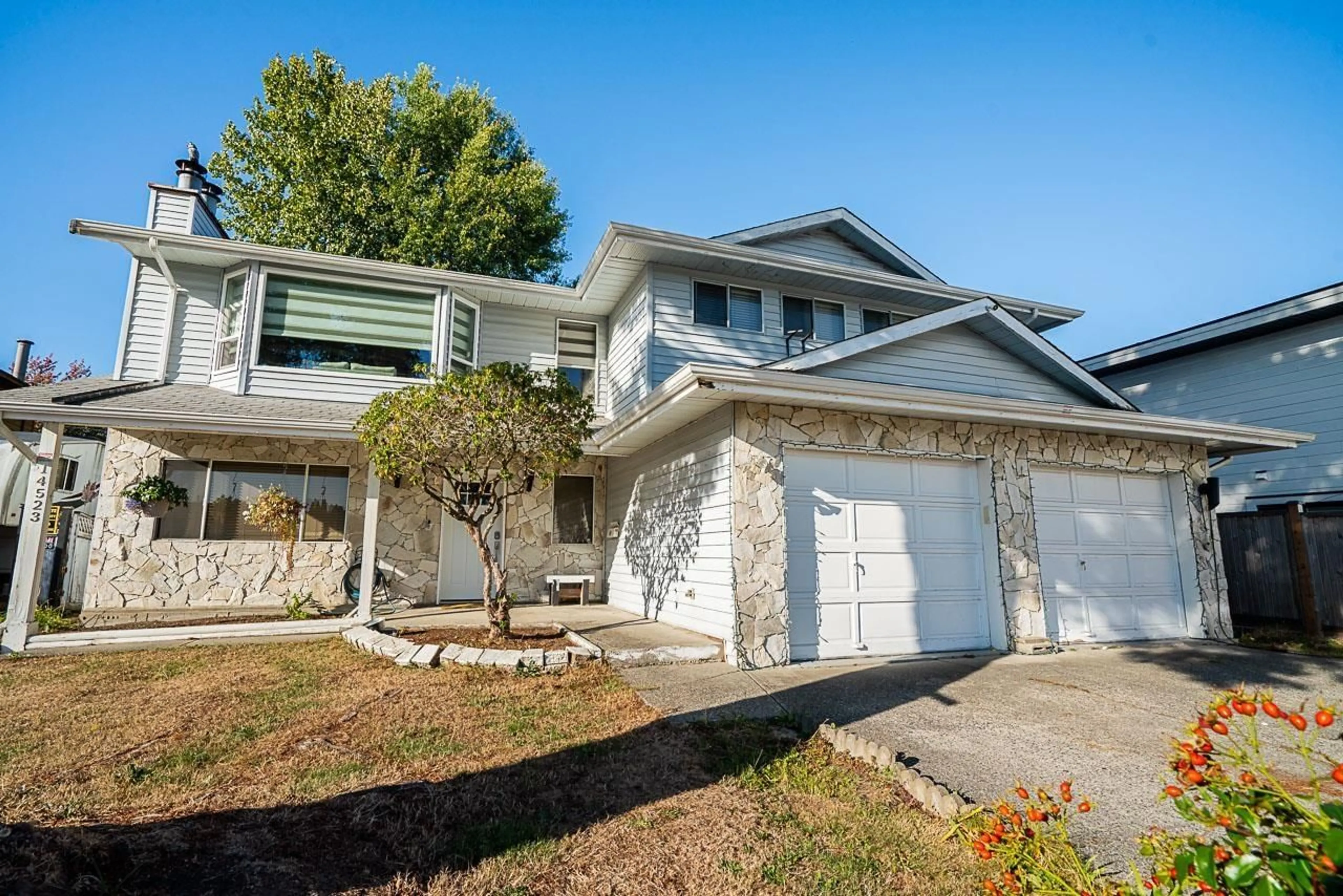 Home with vinyl exterior material, street for 14523 89 AVENUE, Surrey British Columbia V3R8B2