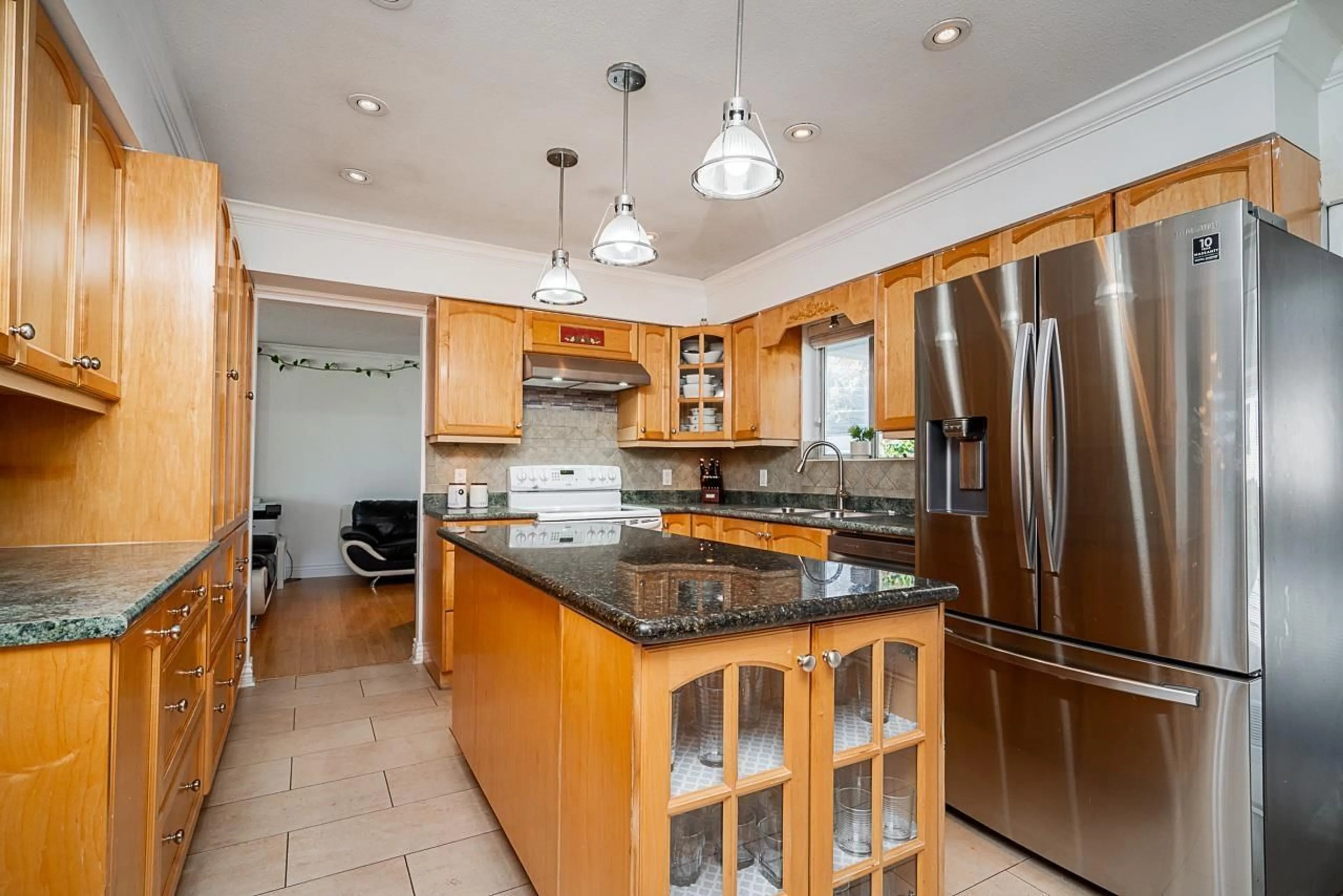 Open concept kitchen, ceramic/tile floor for 14523 89 AVENUE, Surrey British Columbia V3R8B2