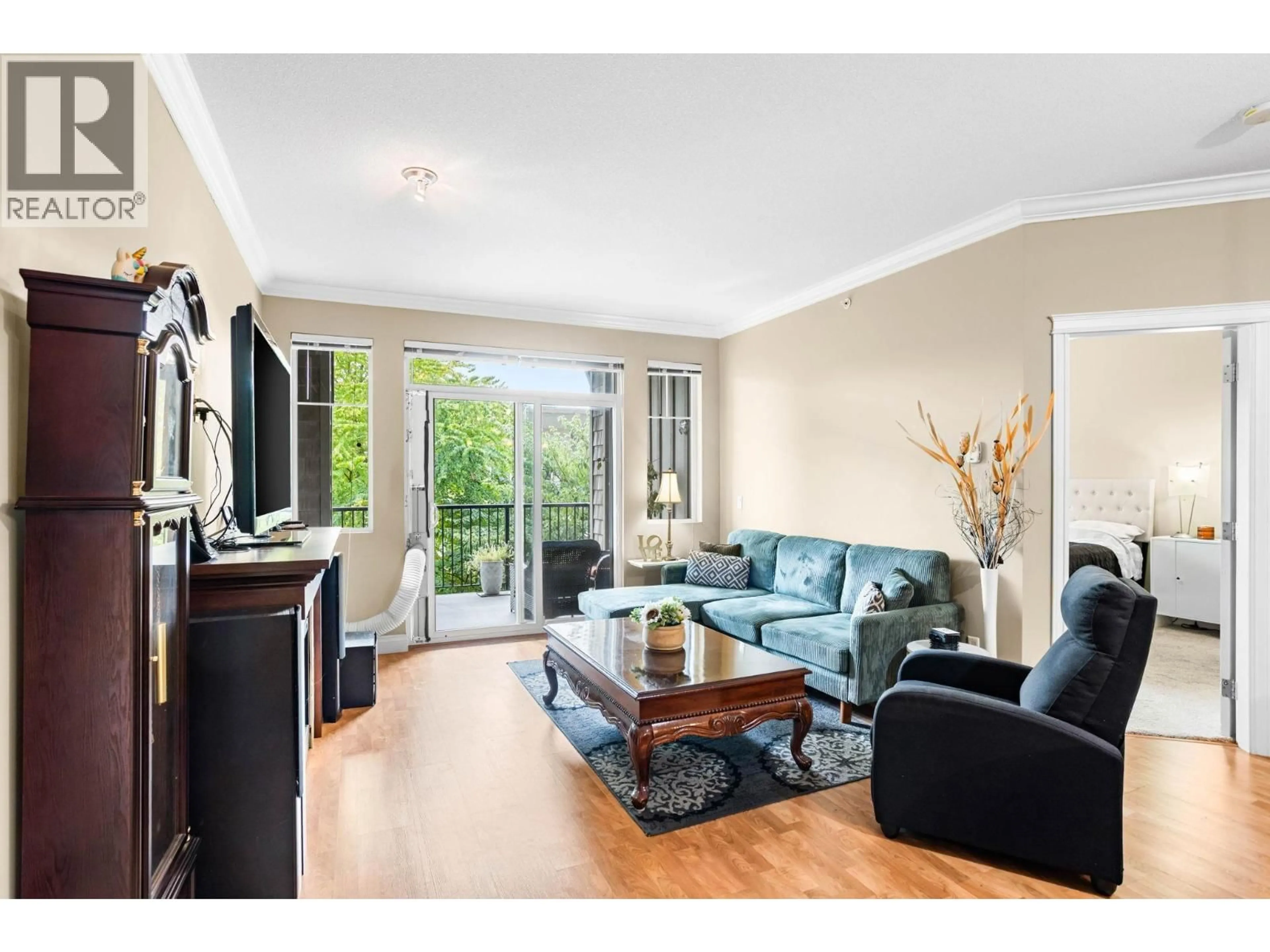 Living room with furniture, wood/laminate floor for 419 - 12258 224 STREET, Maple Ridge British Columbia V2X8Y7