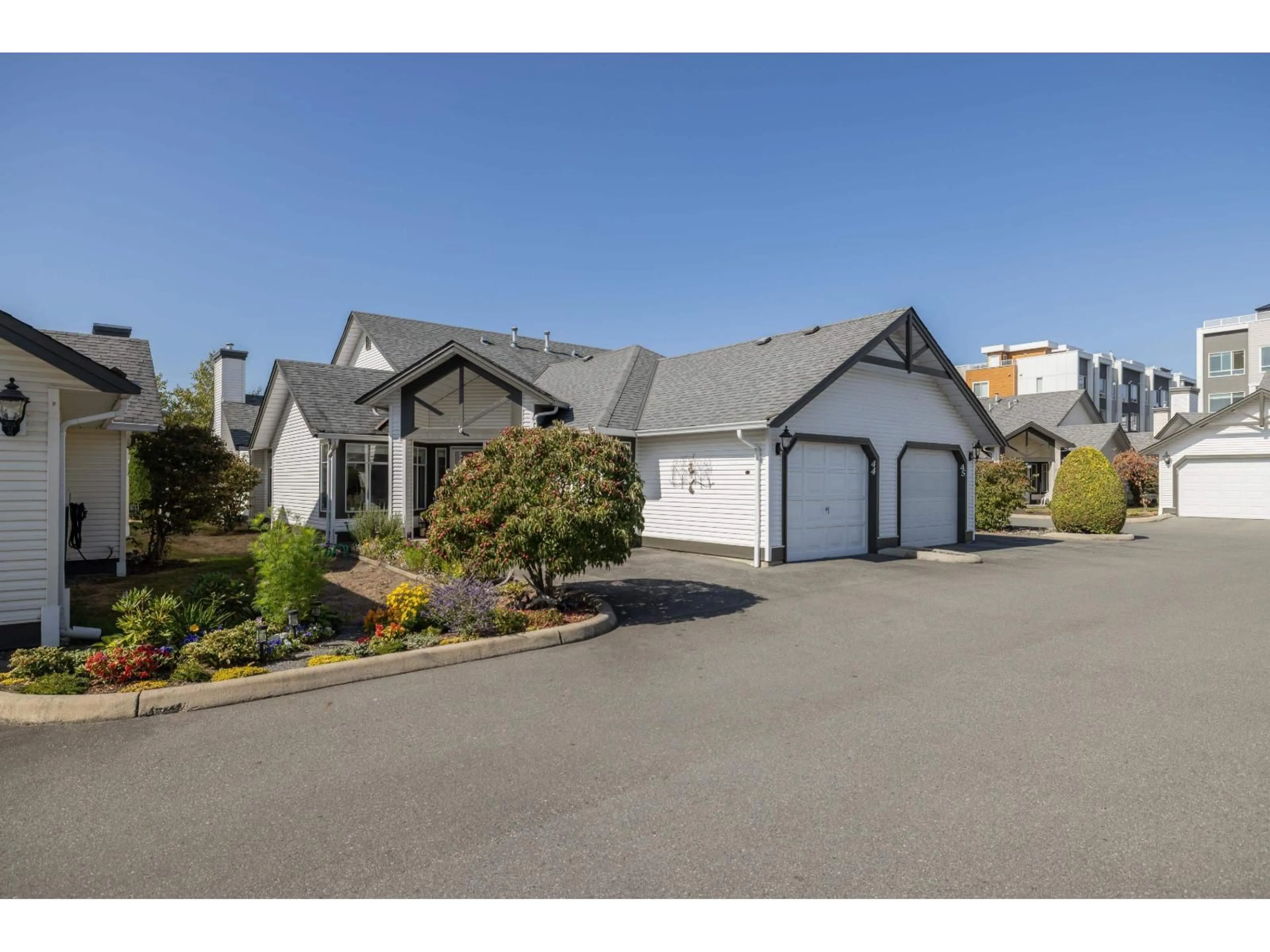 A pic from outside/outdoor area/front of a property/back of a property/a pic from drone, street for 44 - 19649 53 AVENUE, Langley British Columbia V3A8C5